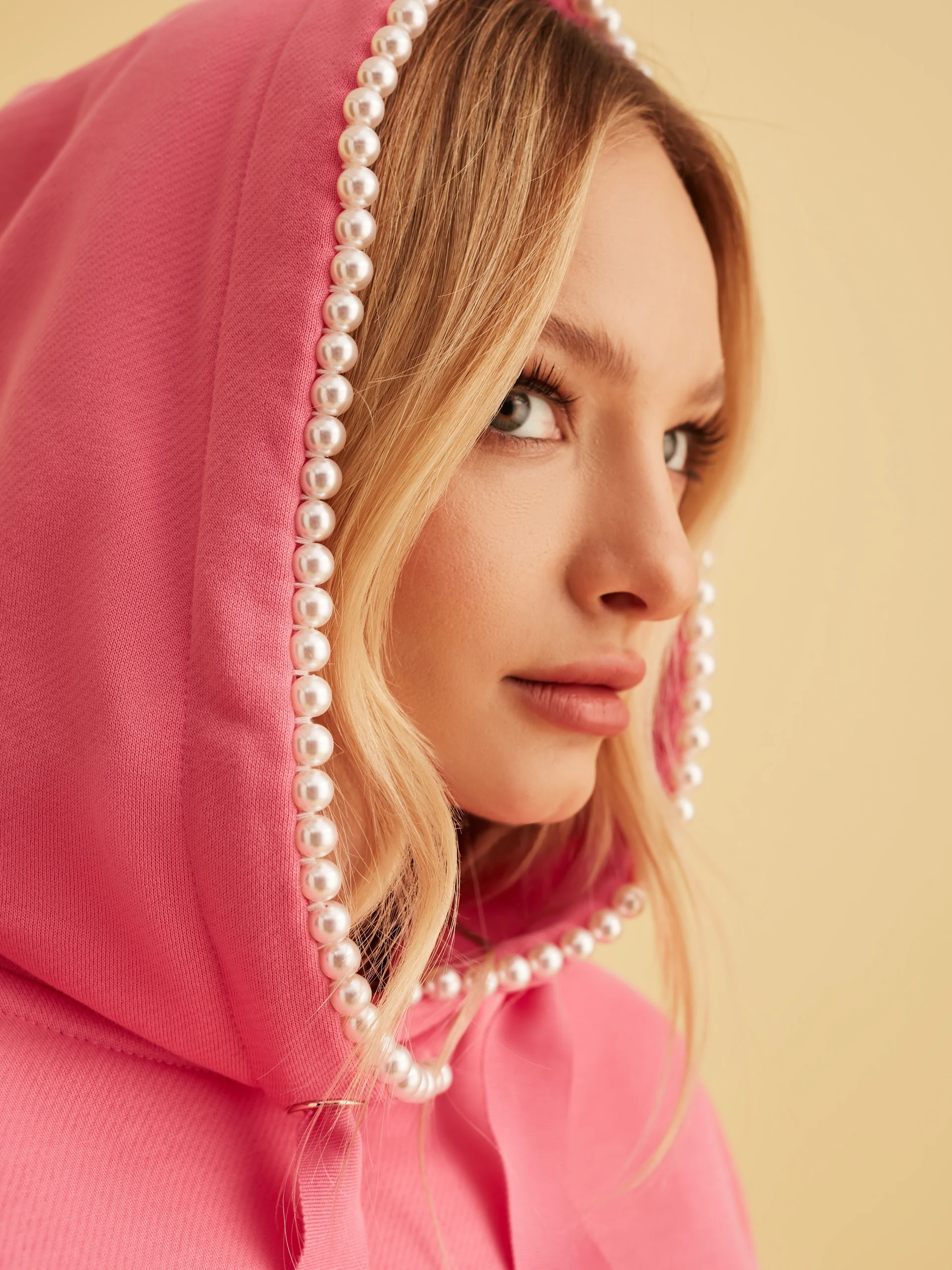 PINK BLOUSE WITH PEARL DETAILS ON HOOD