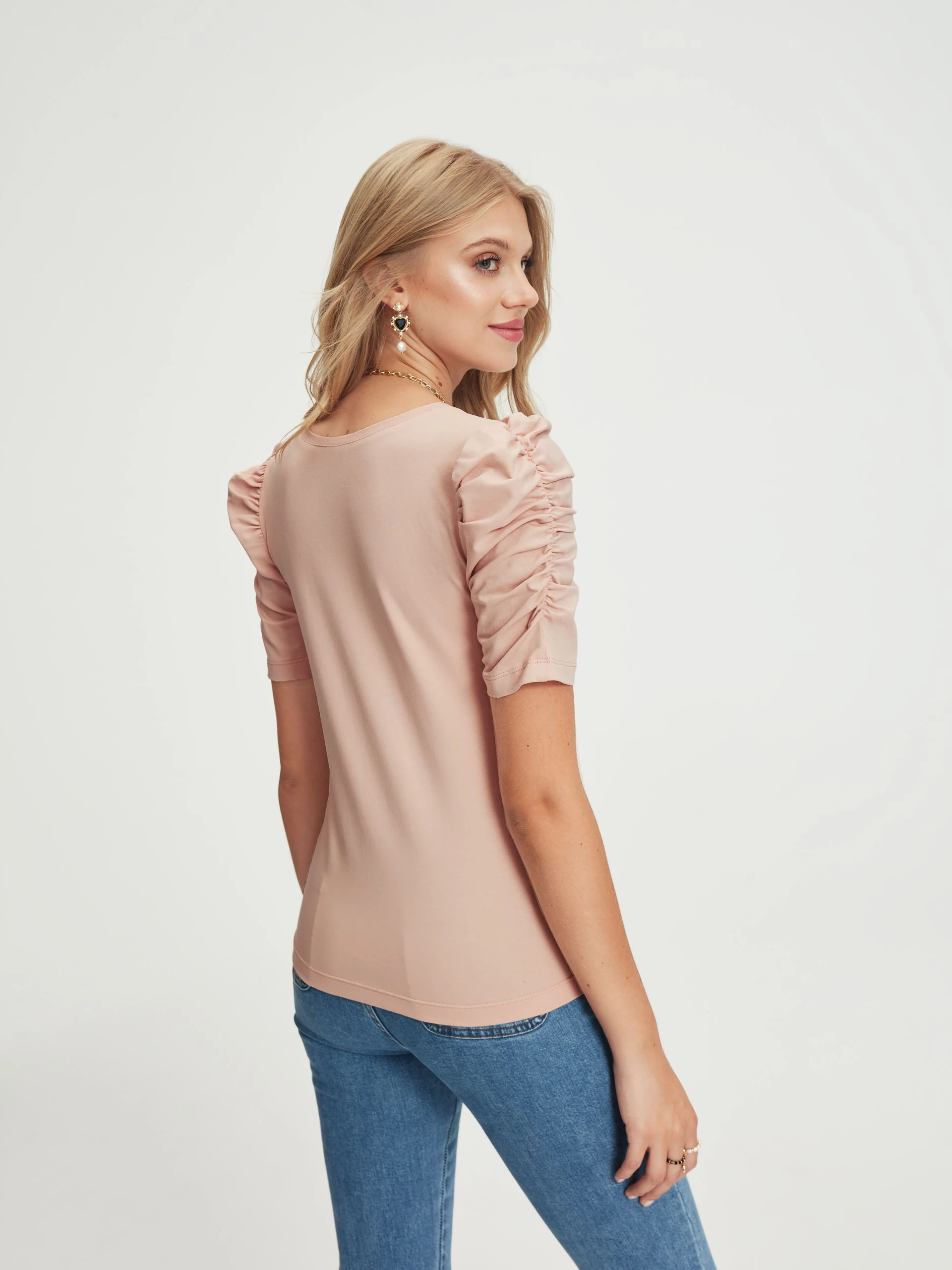 Powder pink blouse with puff sleeves