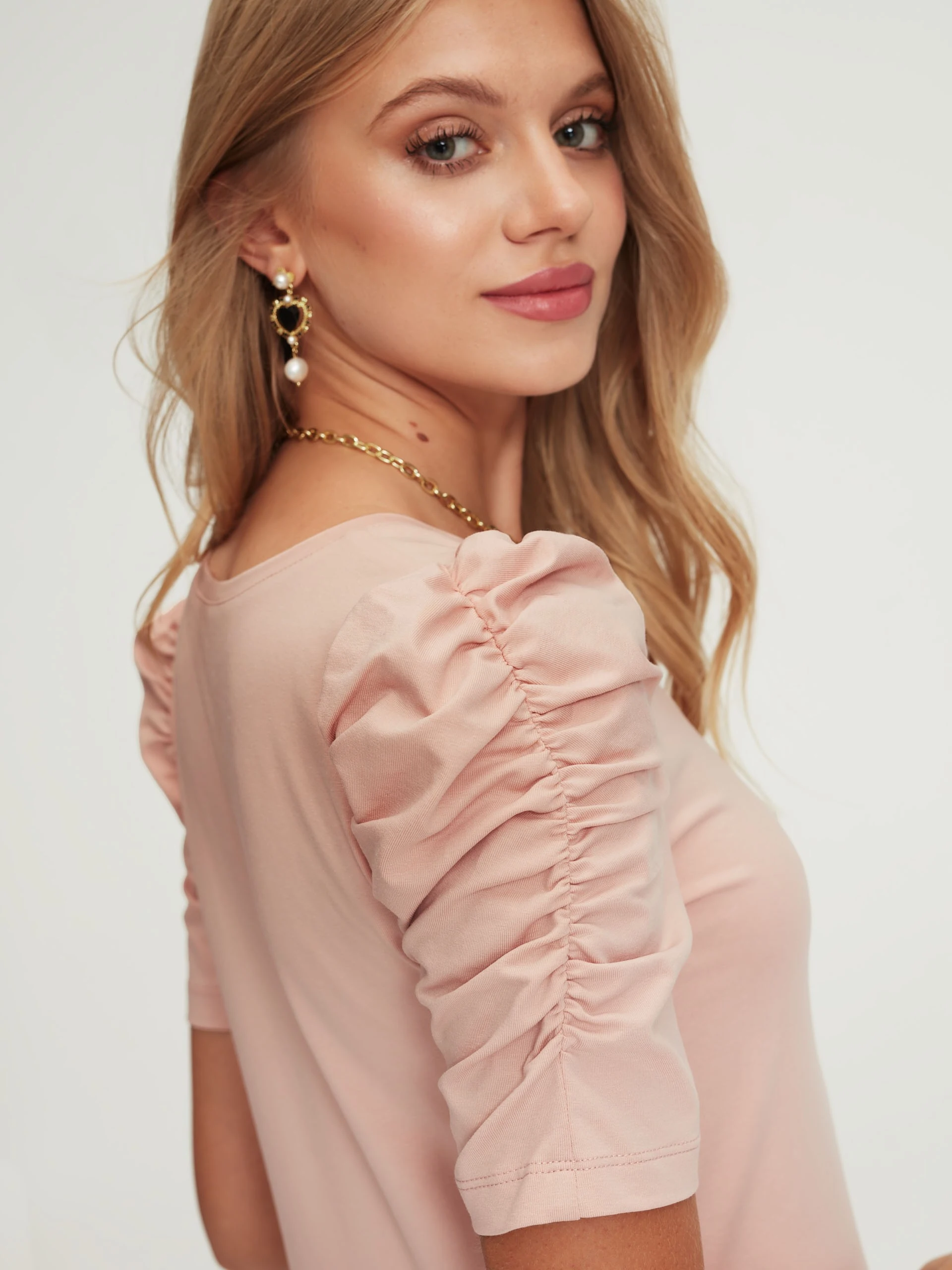 Powder pink blouse with puff sleeves
