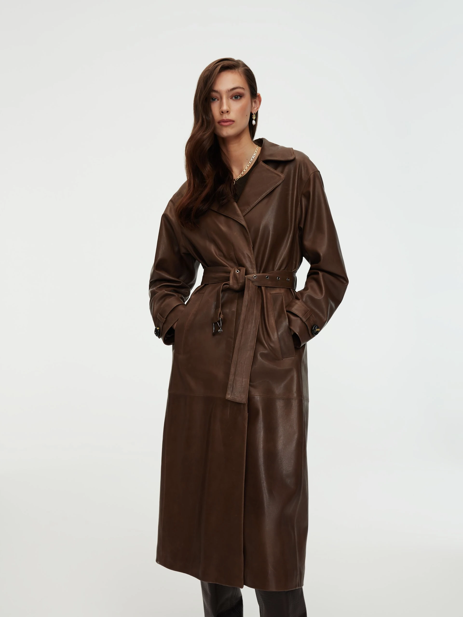 Leather coat in brown color