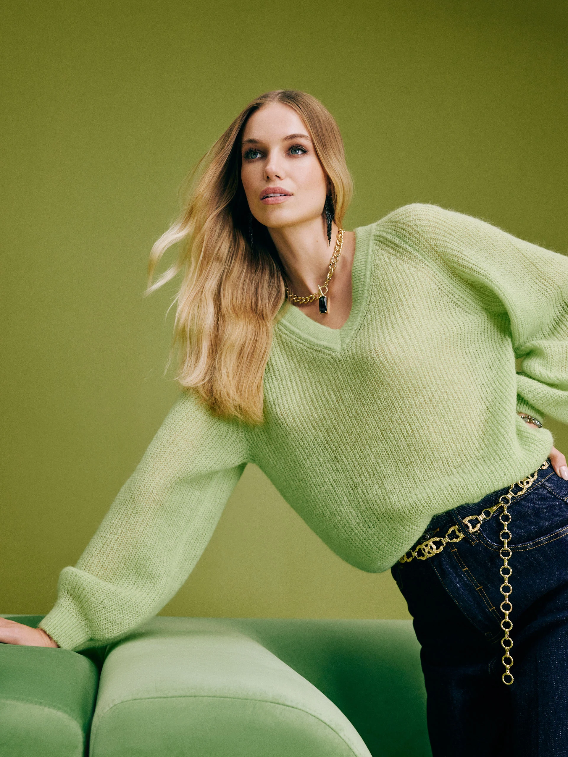 Knitted blouse in lime green color