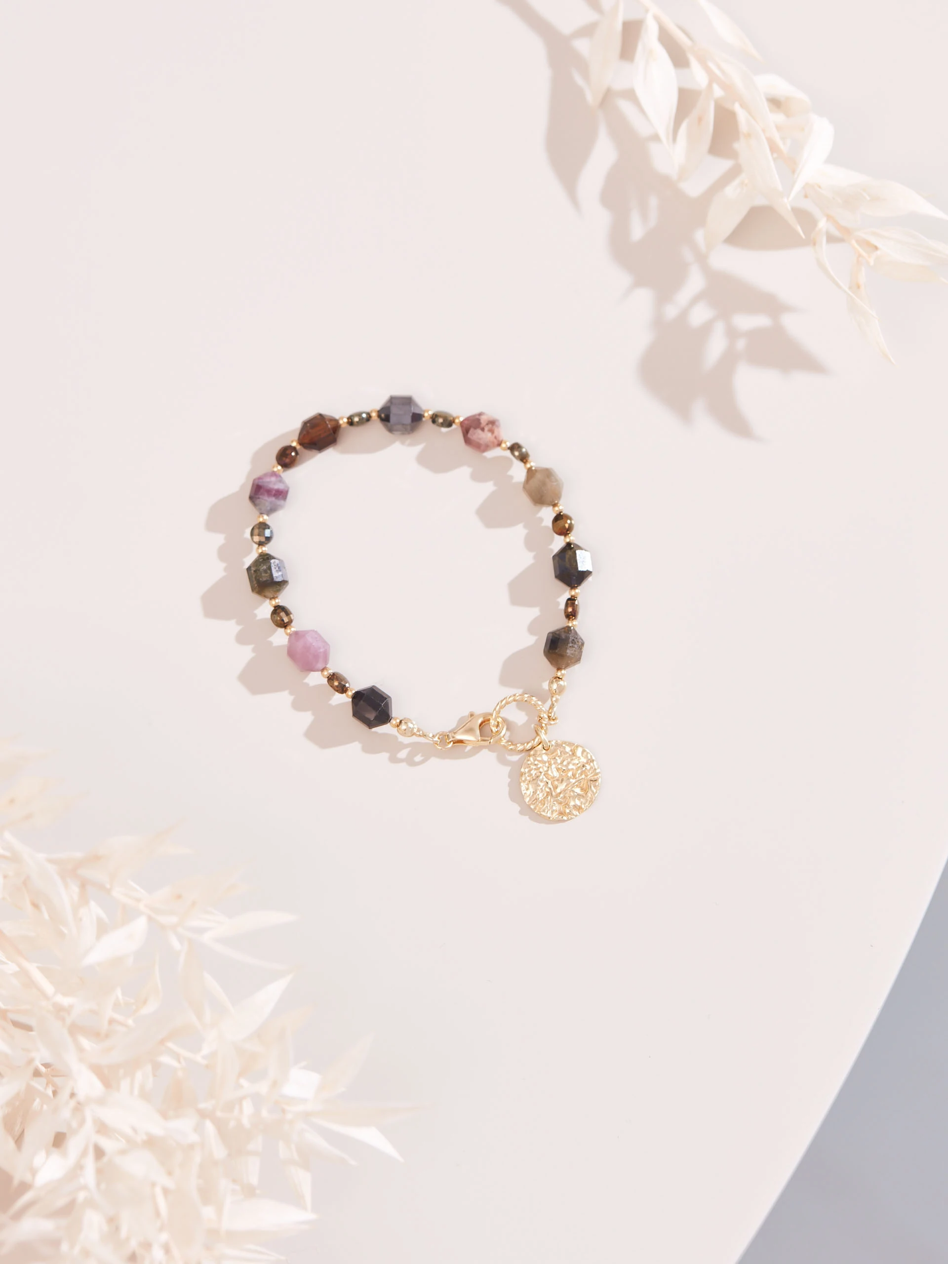 BRACELET WITH COLORED STONES AND COIN