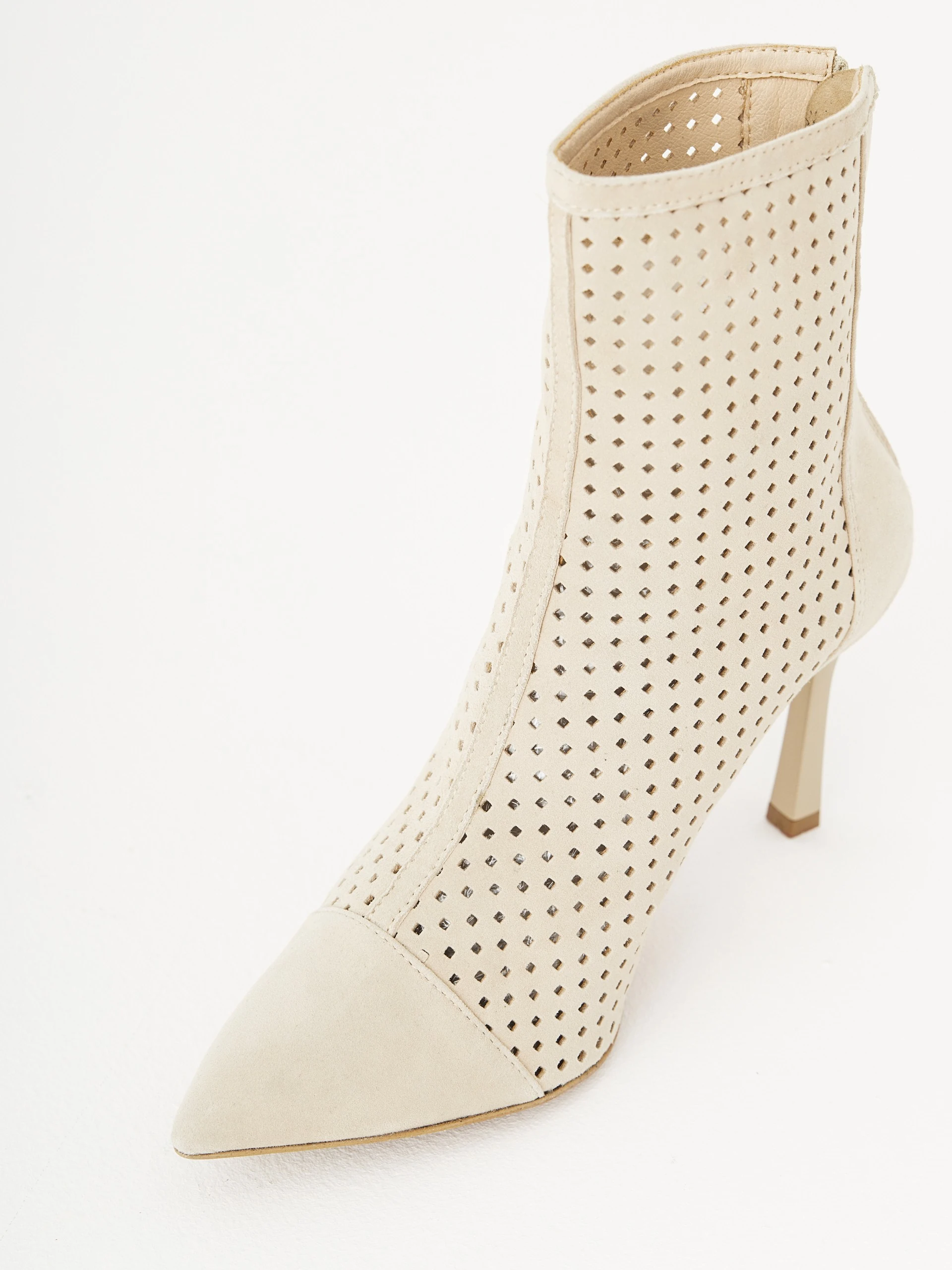 Beige ankle boots on heels