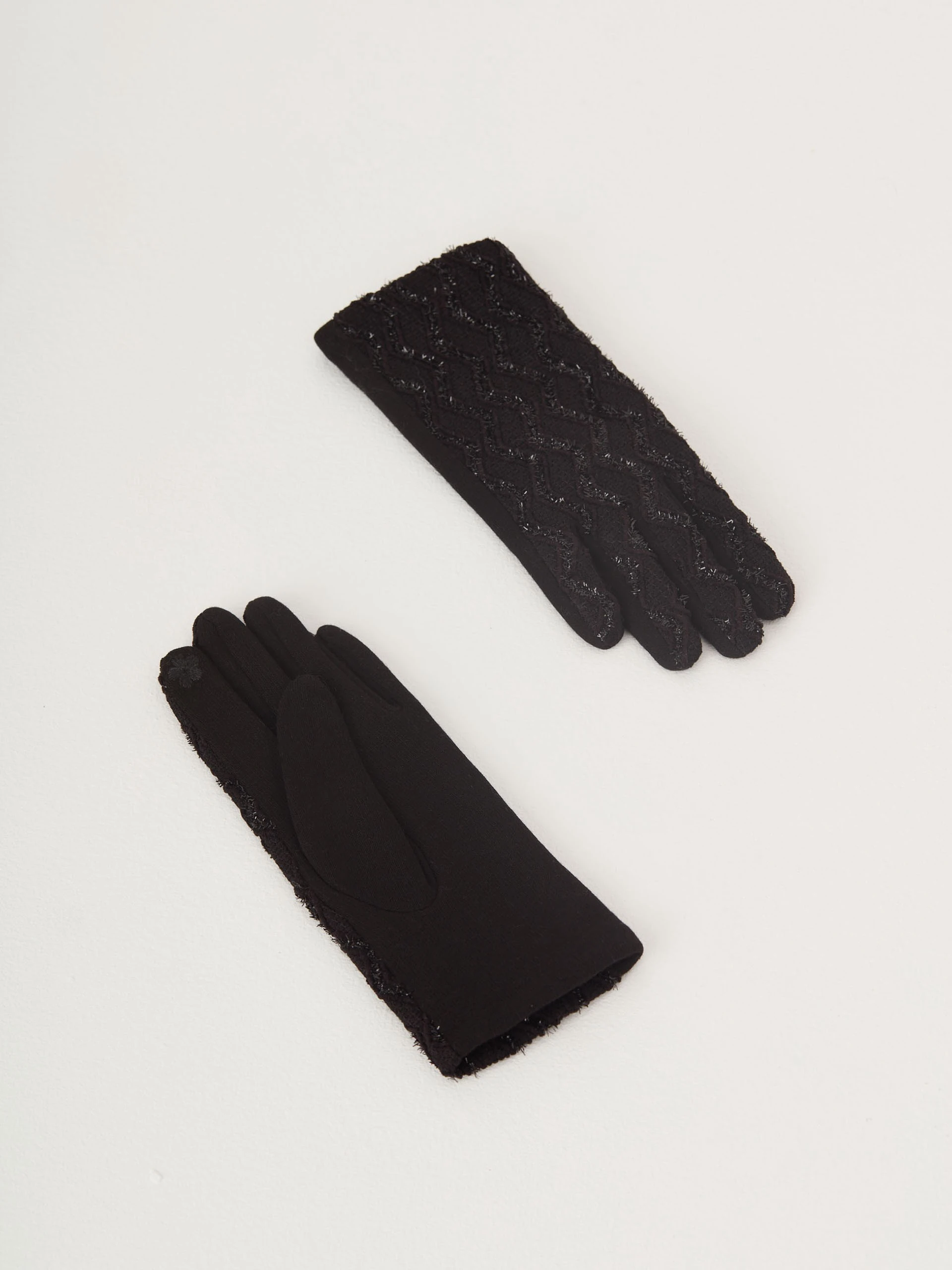 Knitted black gloves