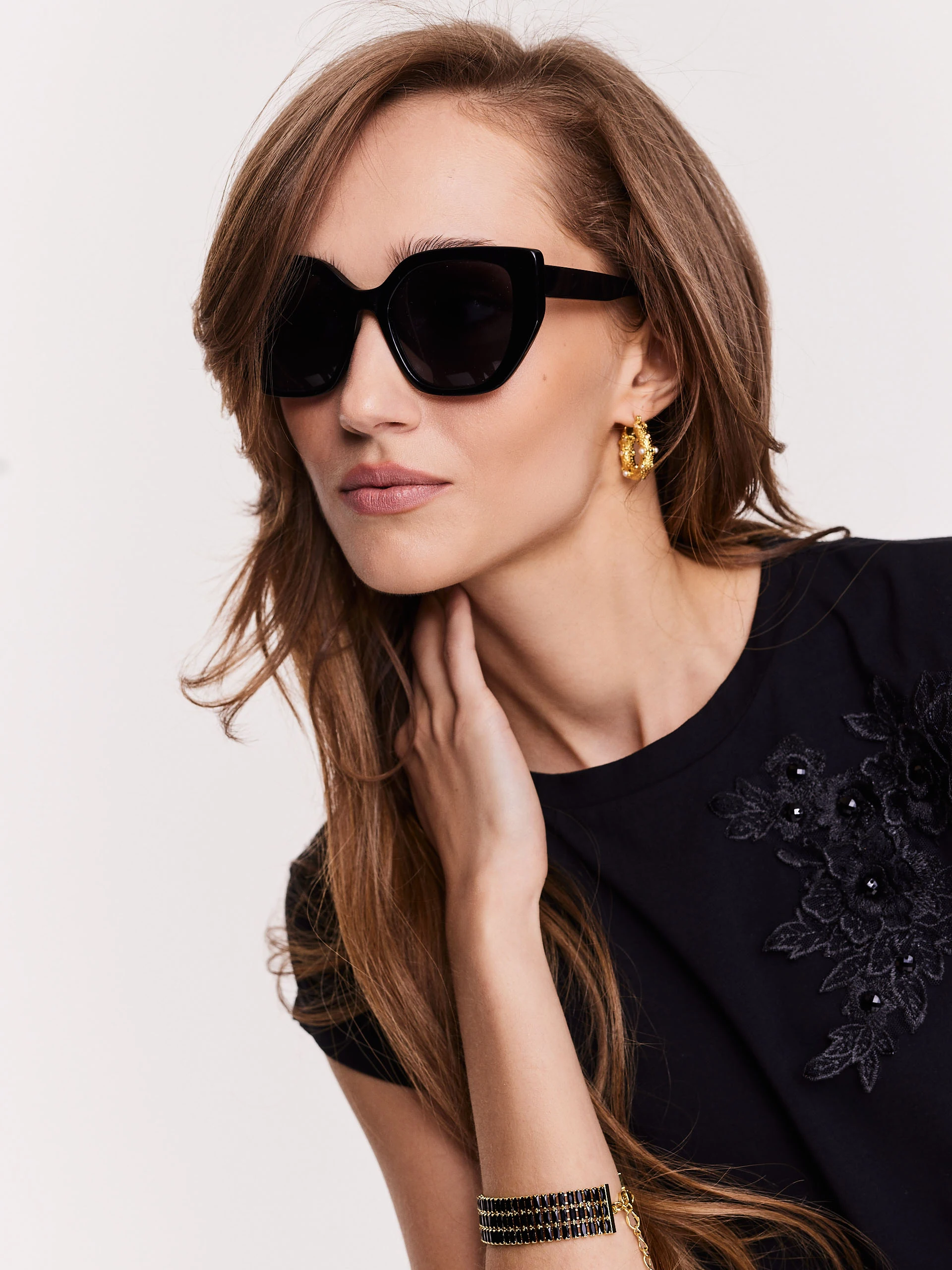 Large black sunglasses with plastic frames
