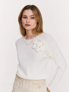 Cream sweater with rose embellishments