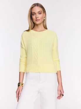 Light yellow cotton sweater with cable knit pattern