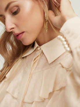 Light color blouse with ruffles