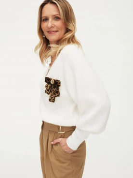 White sweater with V neckline