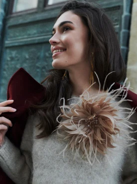 Beige brooch made of marabou feathers with zirconia stones
