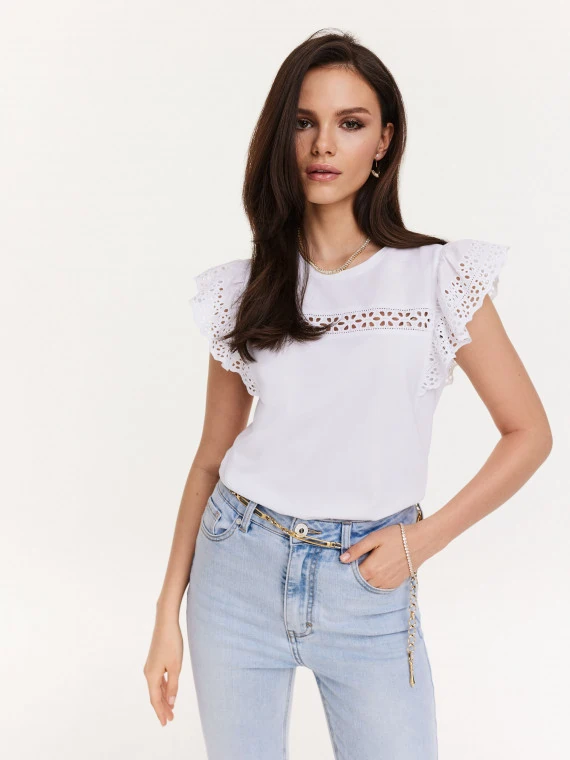 White blouse with openwork inserts