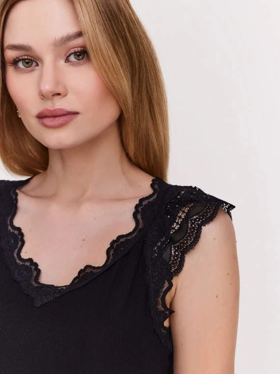 Black blouse with short sleeves and lace inserts