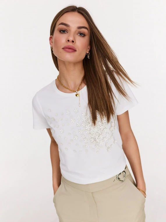 White blouse with patch embellishments