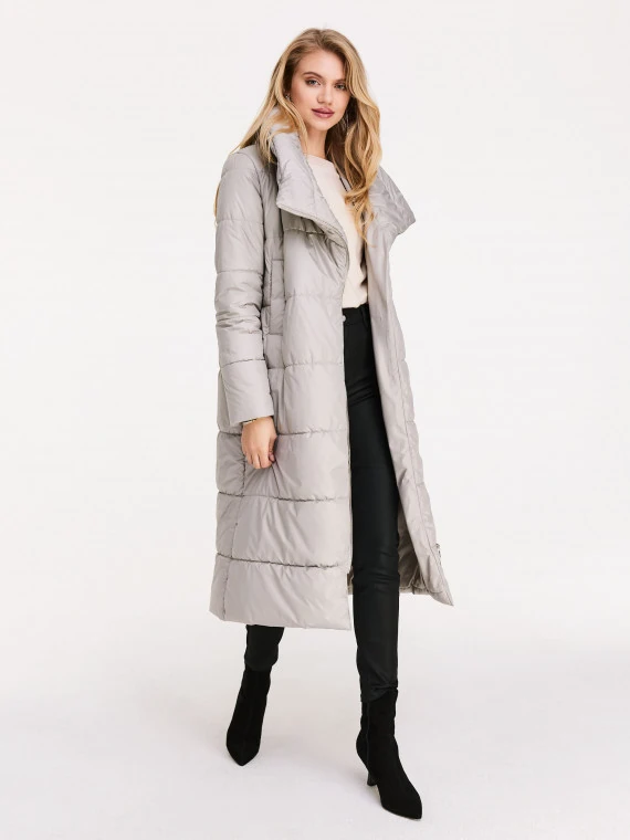 Long quilted coat in beige color