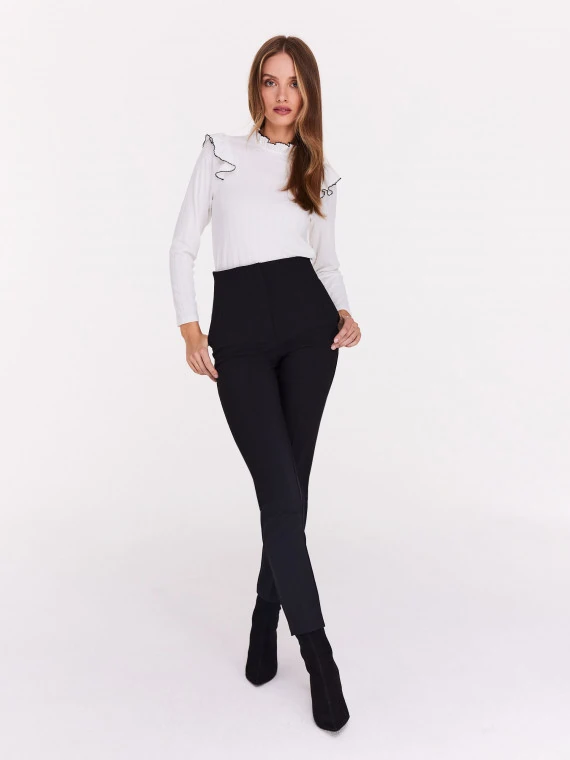White blouse with stand-up collar and ruffles