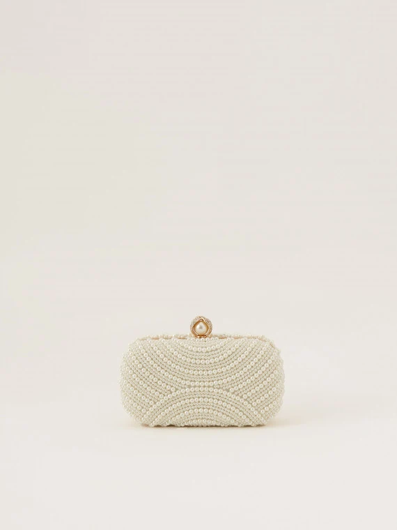 Elegant white handbag decorated with pearls