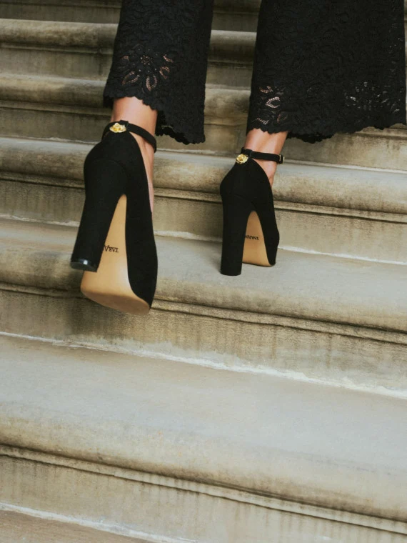 Black suede platform pumps