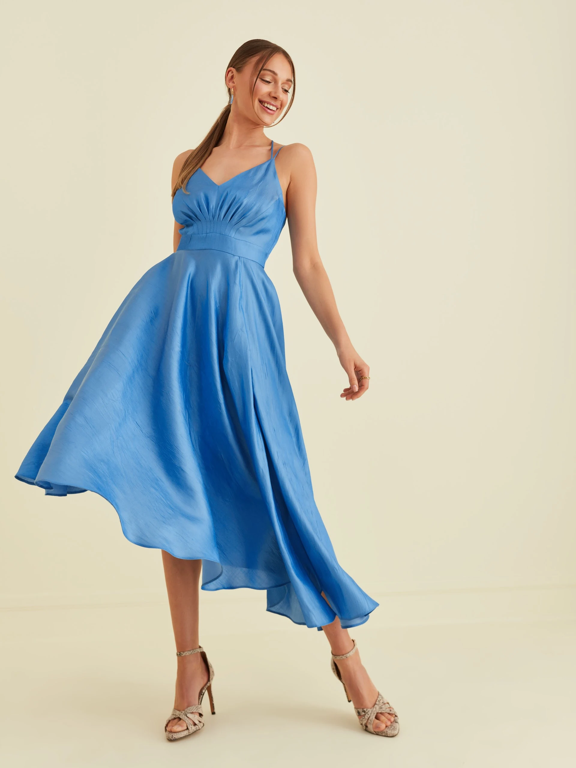 BLUE DRESS WITH ASYMMETRICAL HEM