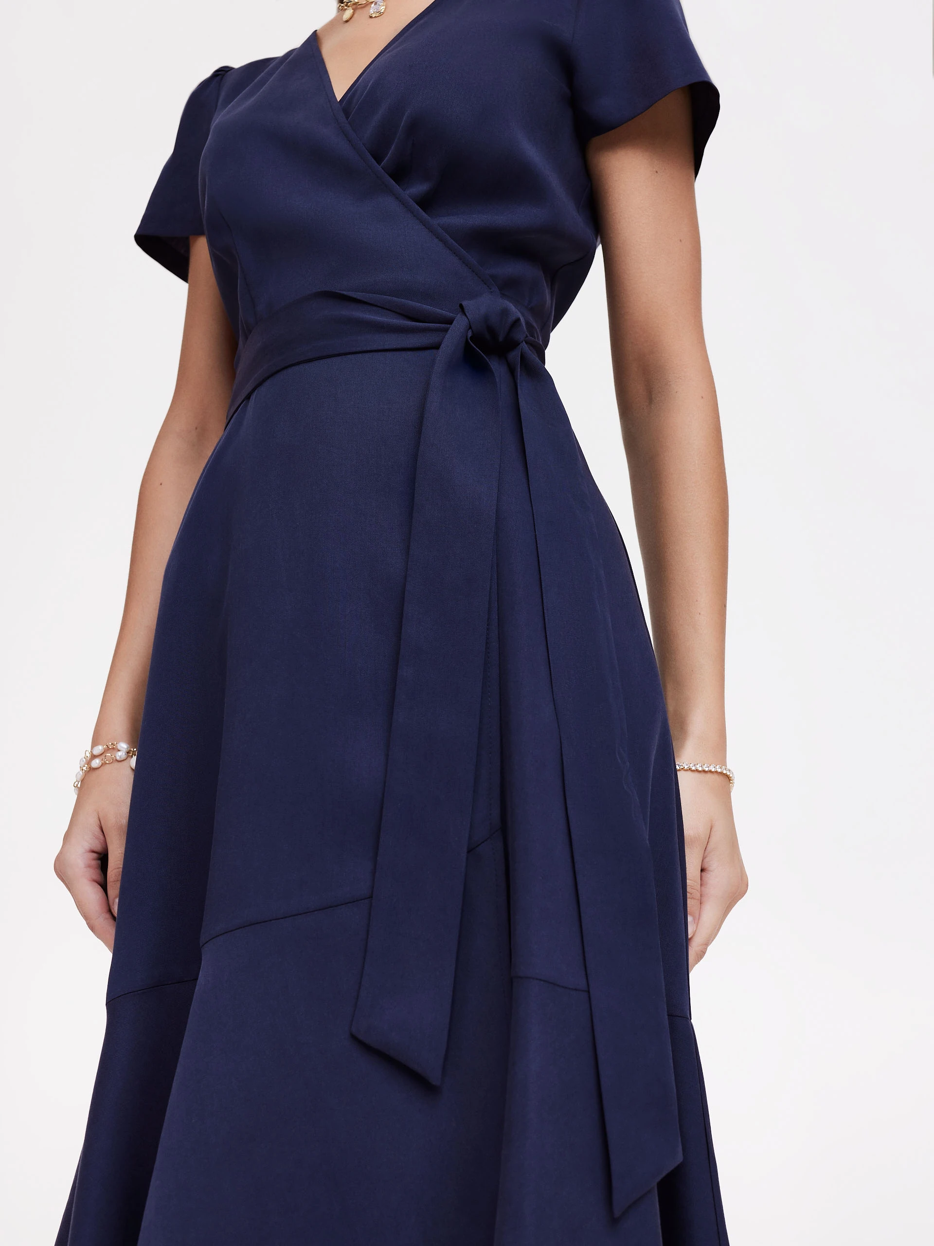 Navy blue dress with envelope neckline