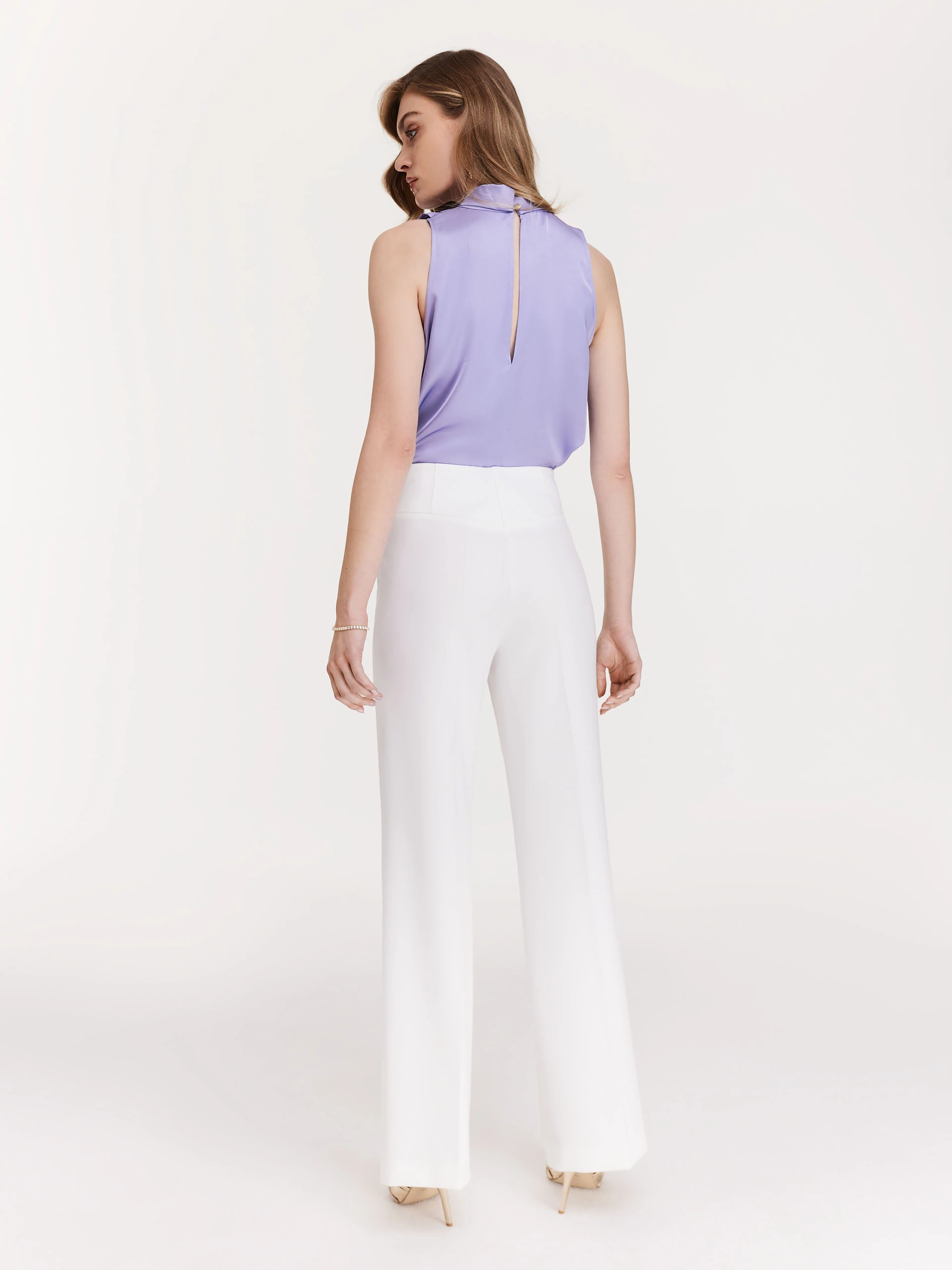 Elegant white pants with flared legs