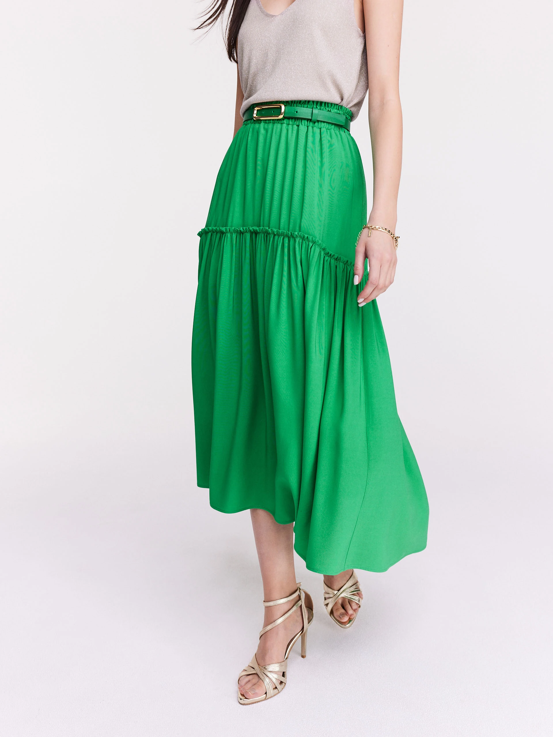Green flared skirt with ruffles