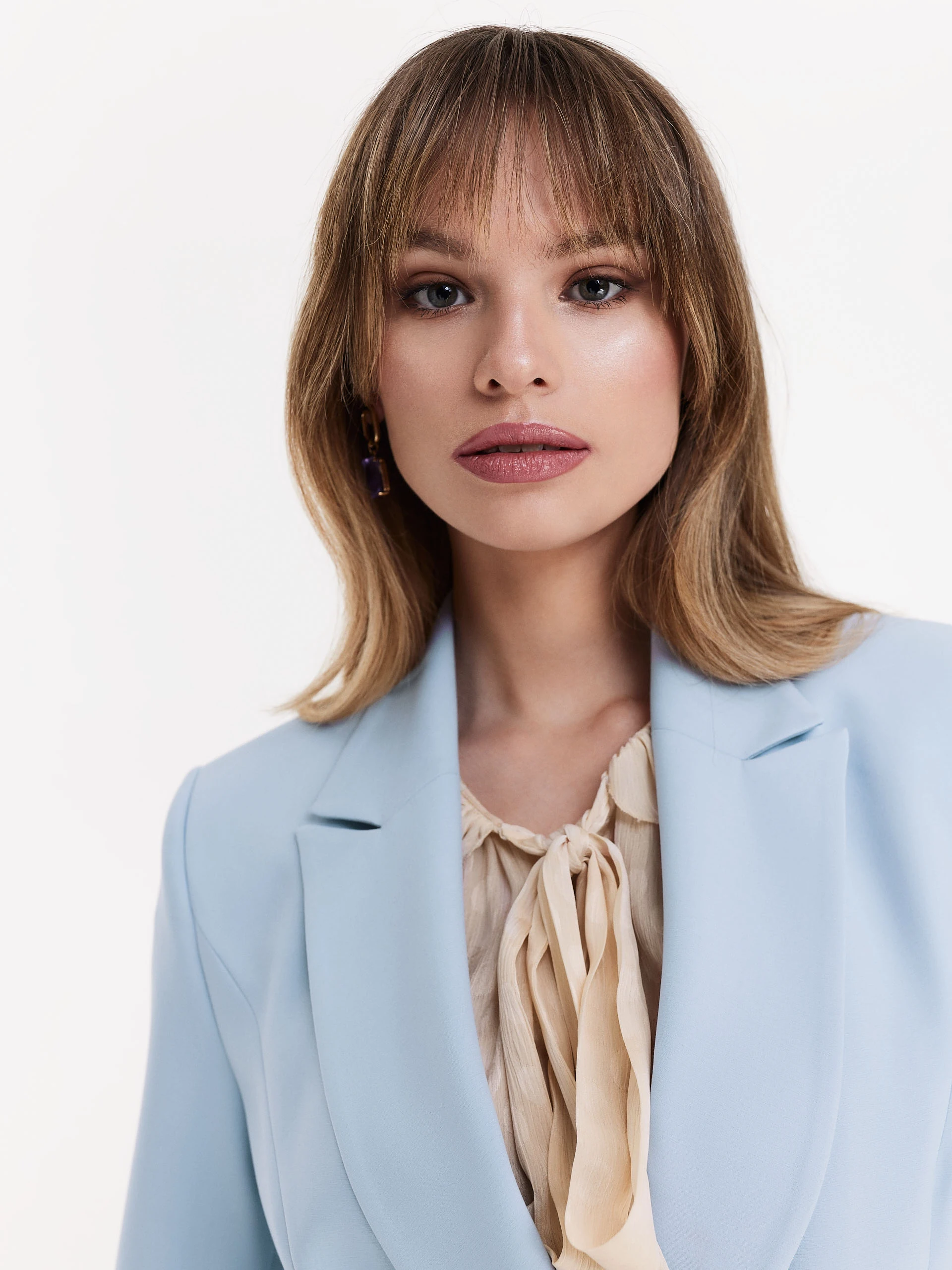 Blue blazer with decorative buttons