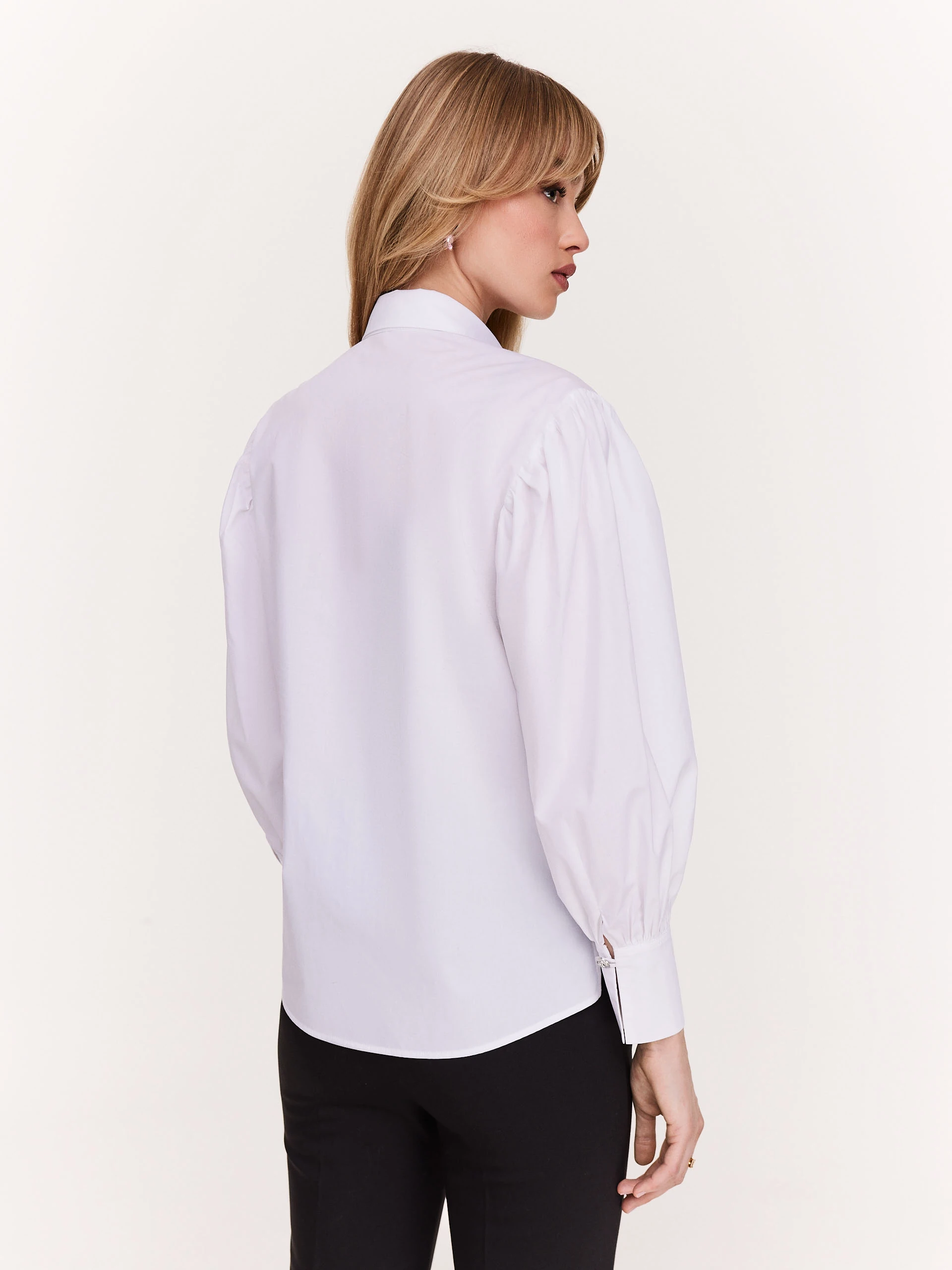 Elegant white shirt with buff sleeves