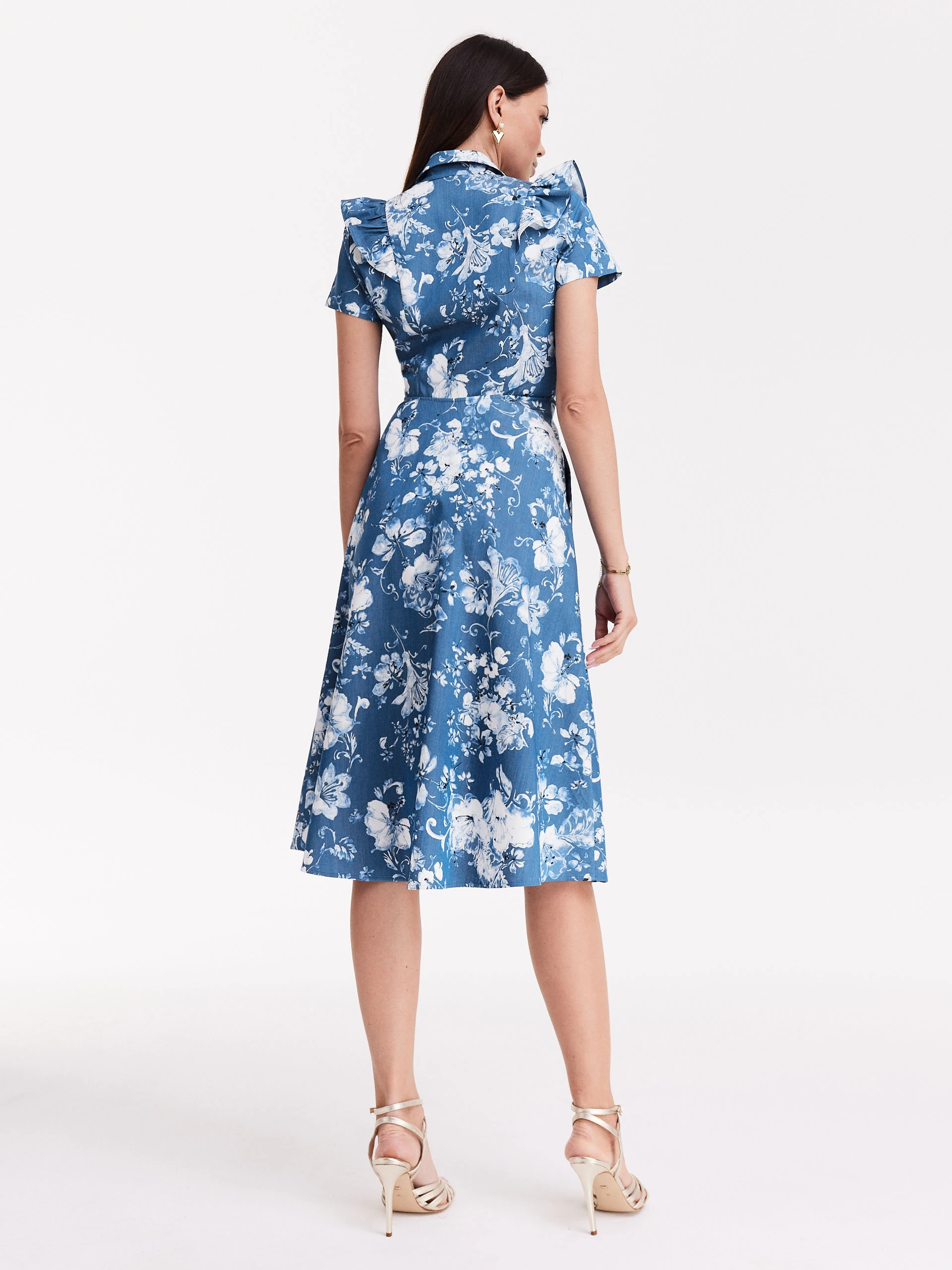 Blue emery type dress with white floral pattern