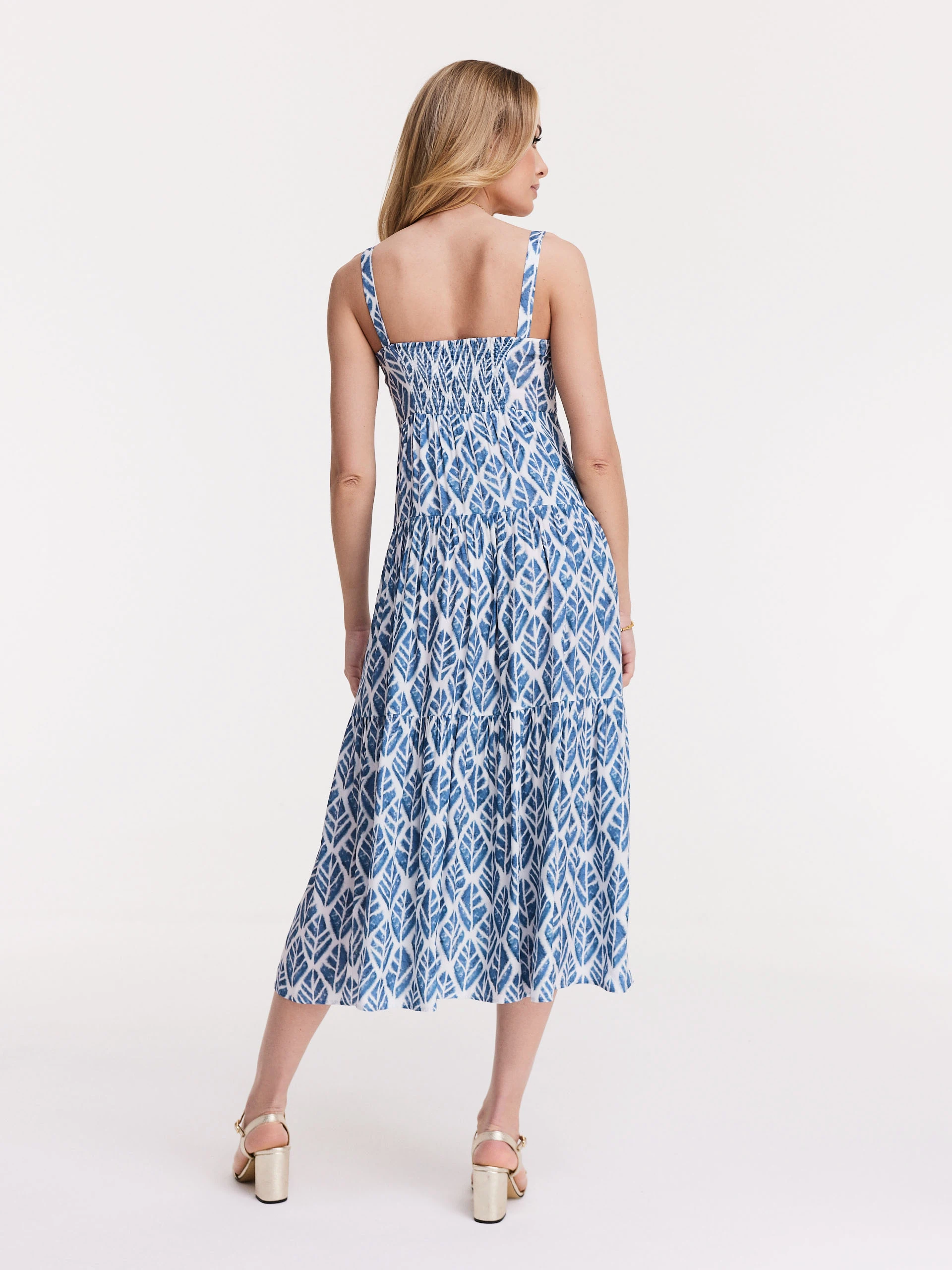 White strapless dress with blue leaves