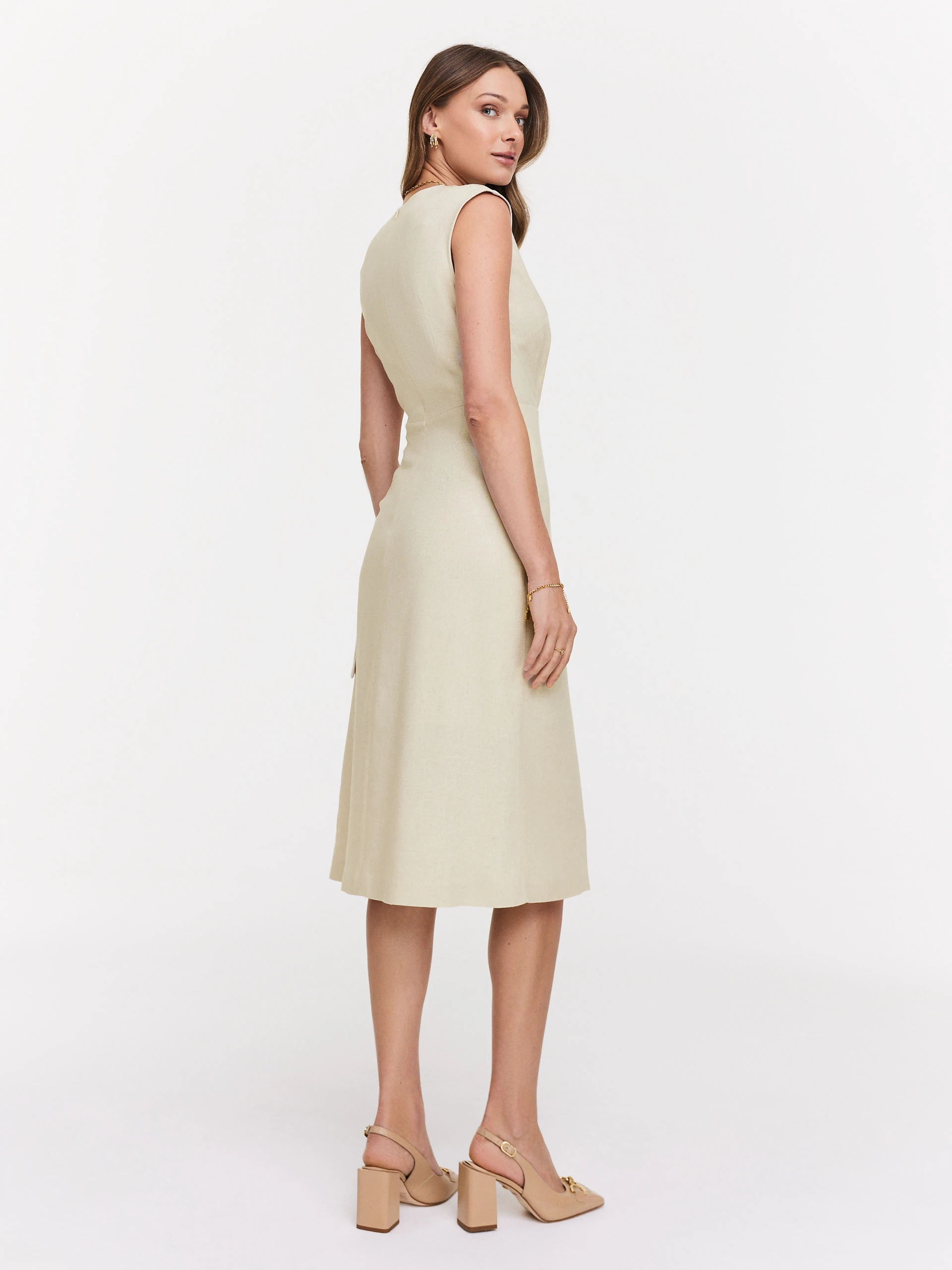 Cream dress with V neckline