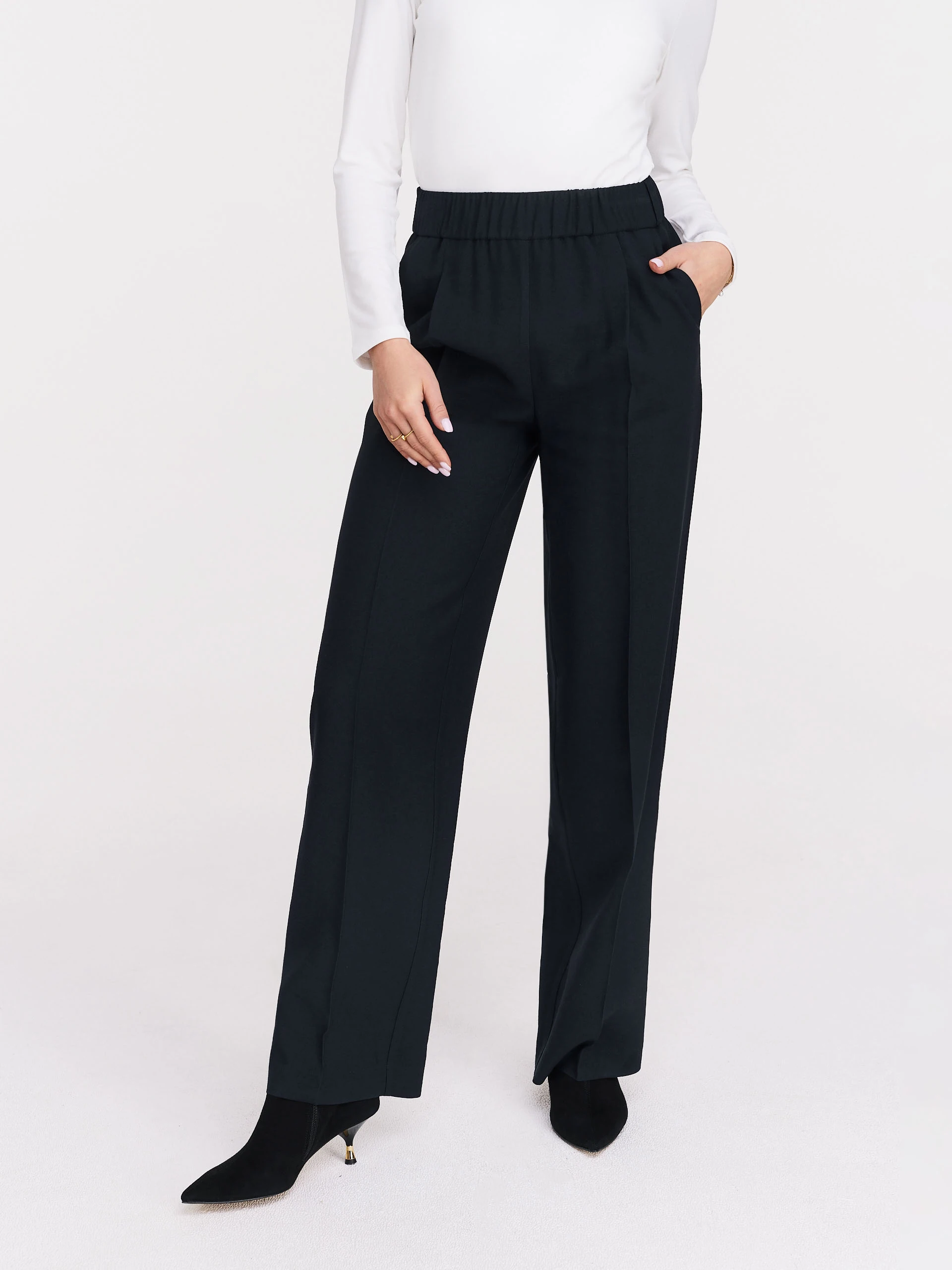 Long black pants with flared legs