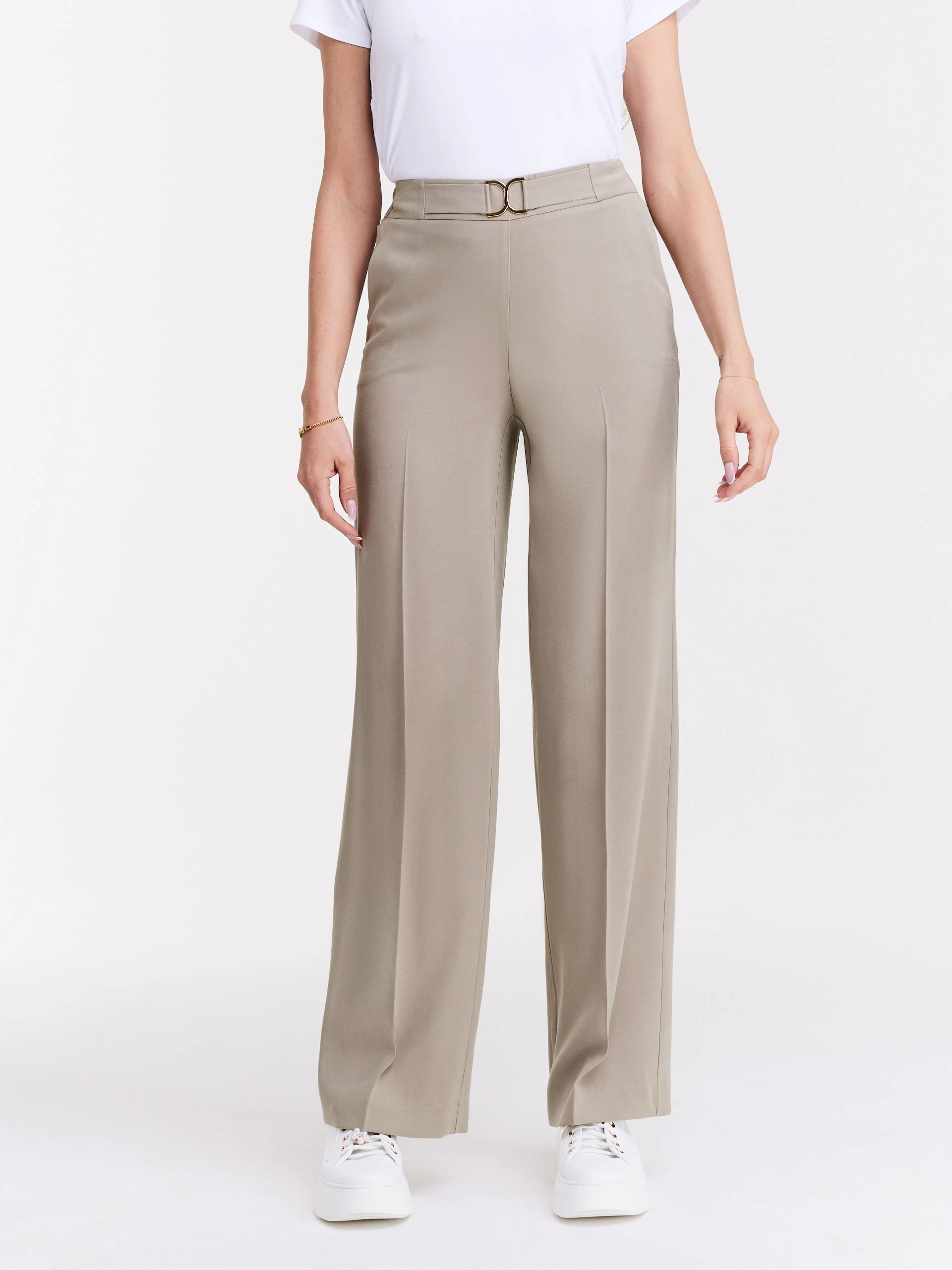 Beige pants with wide legs