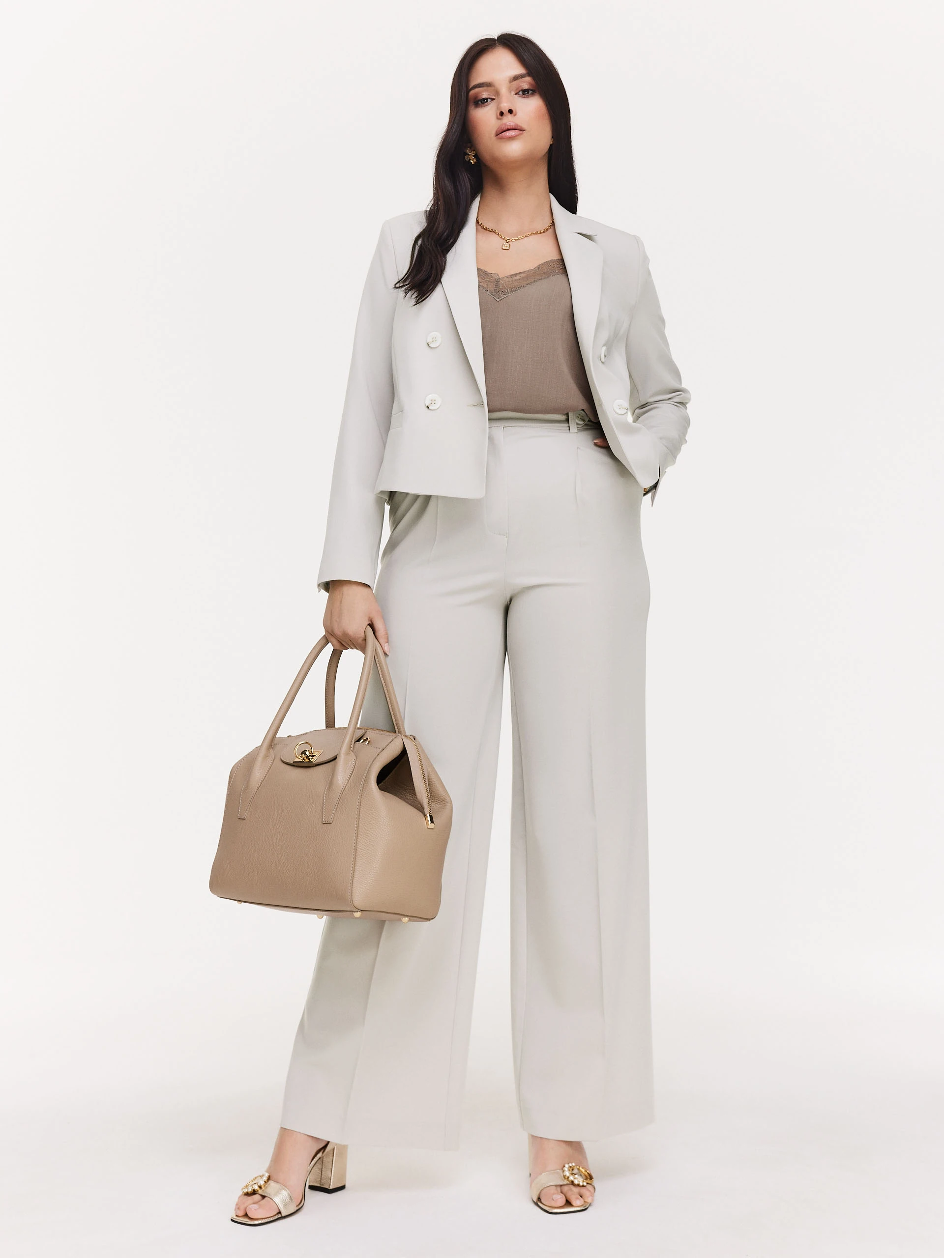 Beige pants pressed at the edge