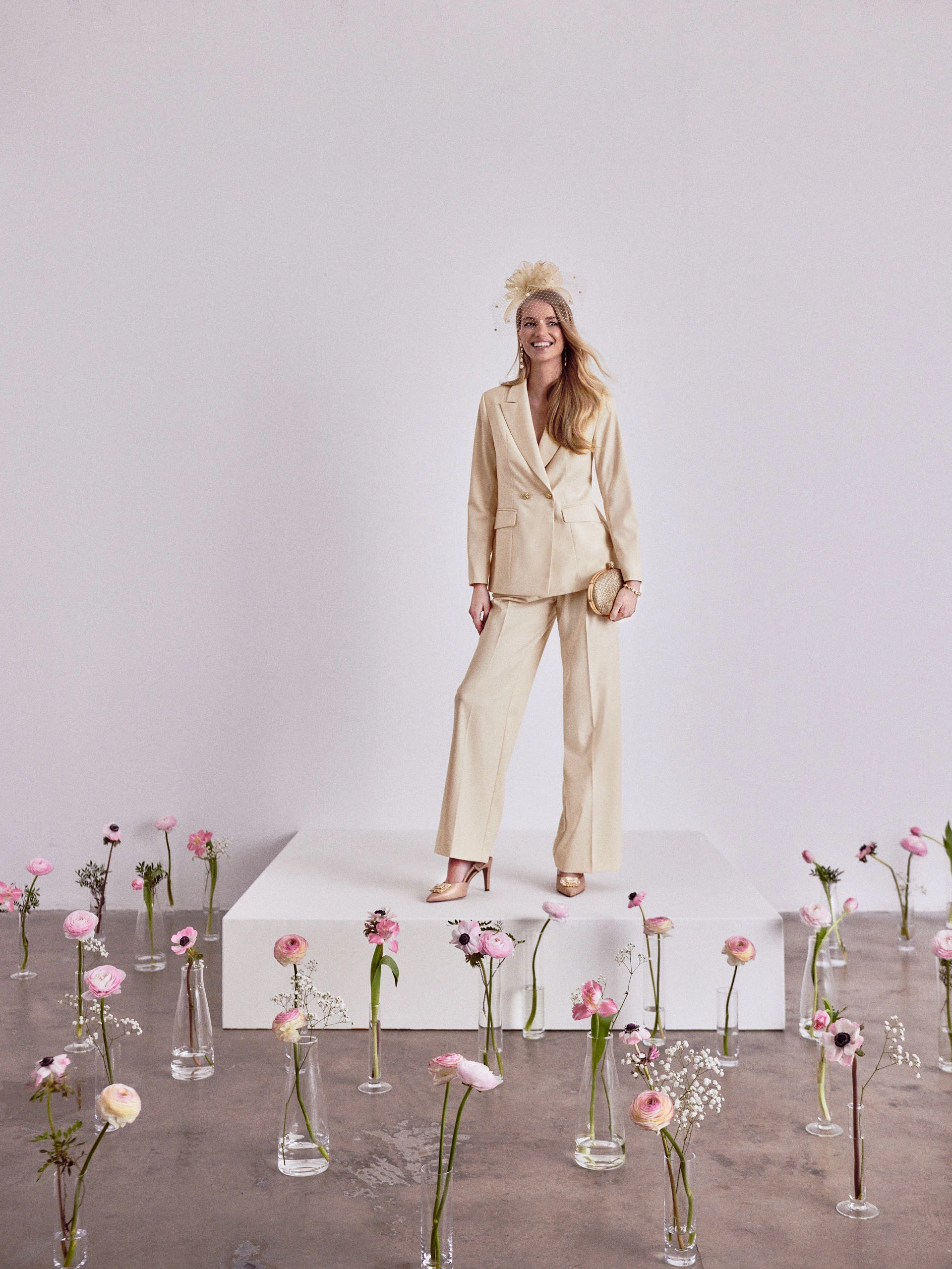 Cream suit jacket with decorative buttons