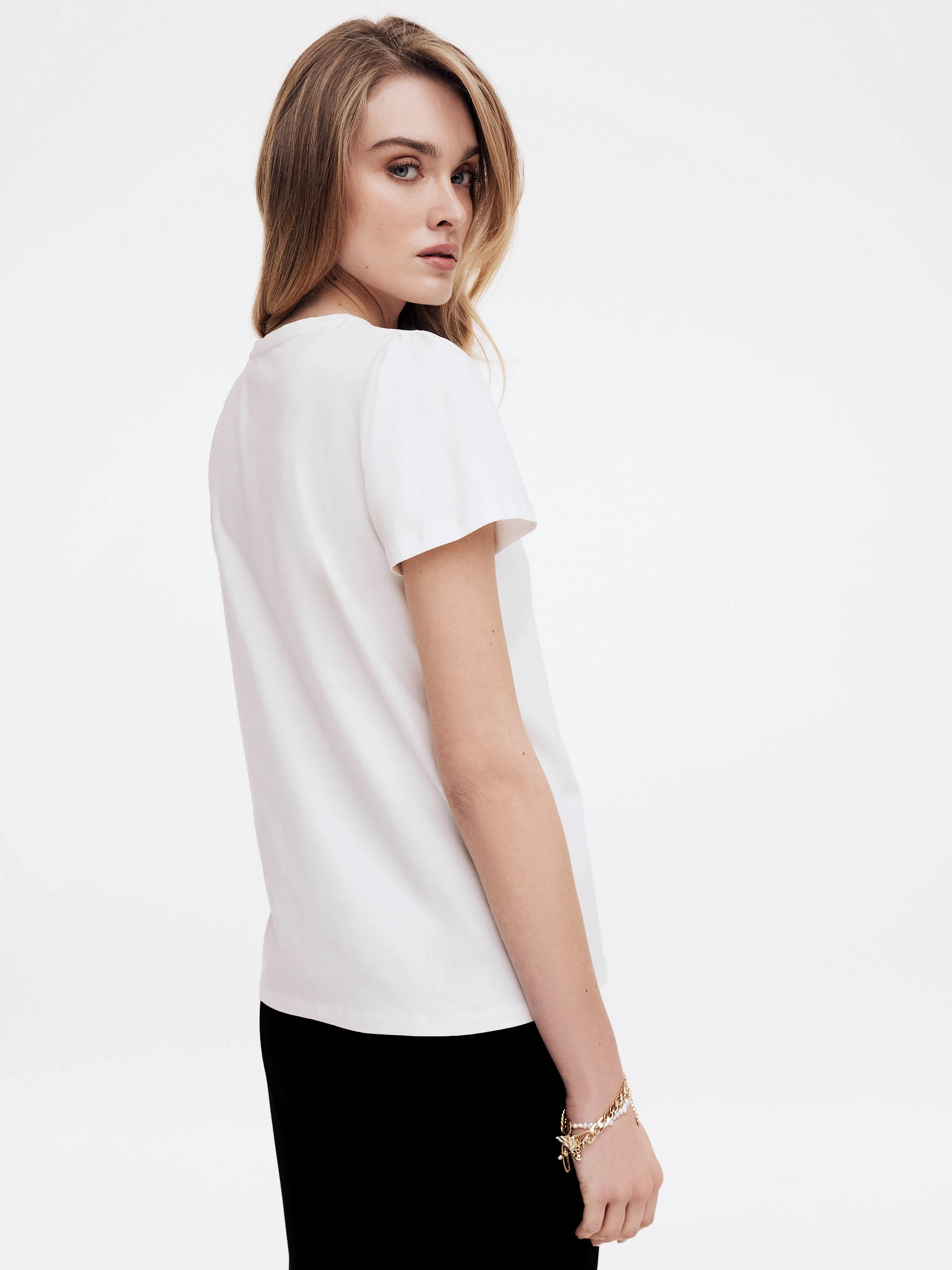 White blouse with bow and short sleeves