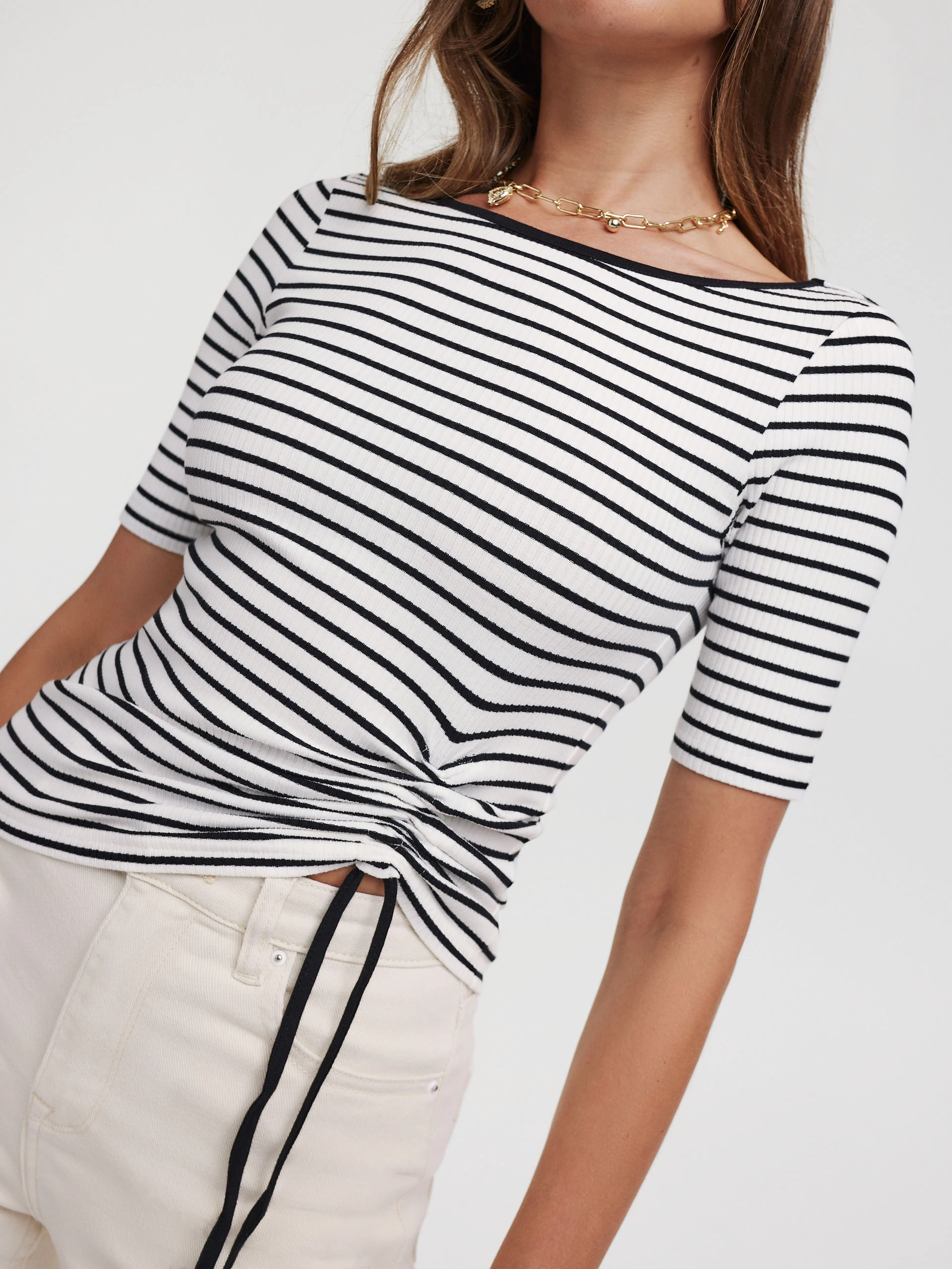 White striped blouse with a crease