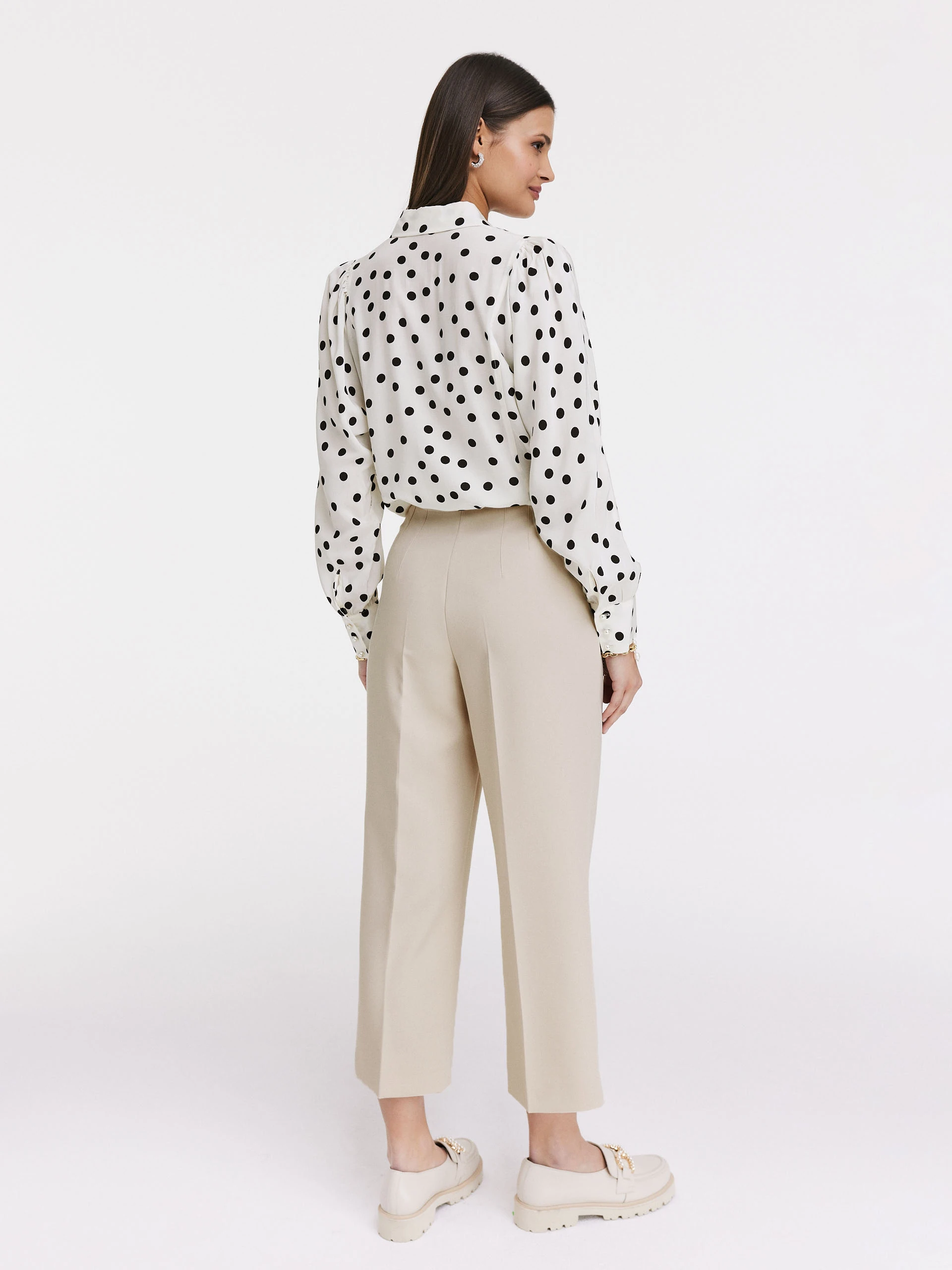 White shirt with black peas