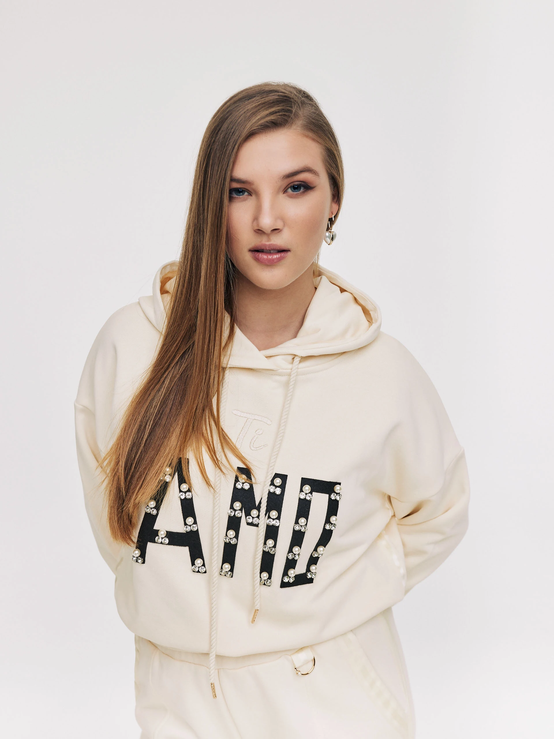 Cream sweatshirt with inscription and hoodie