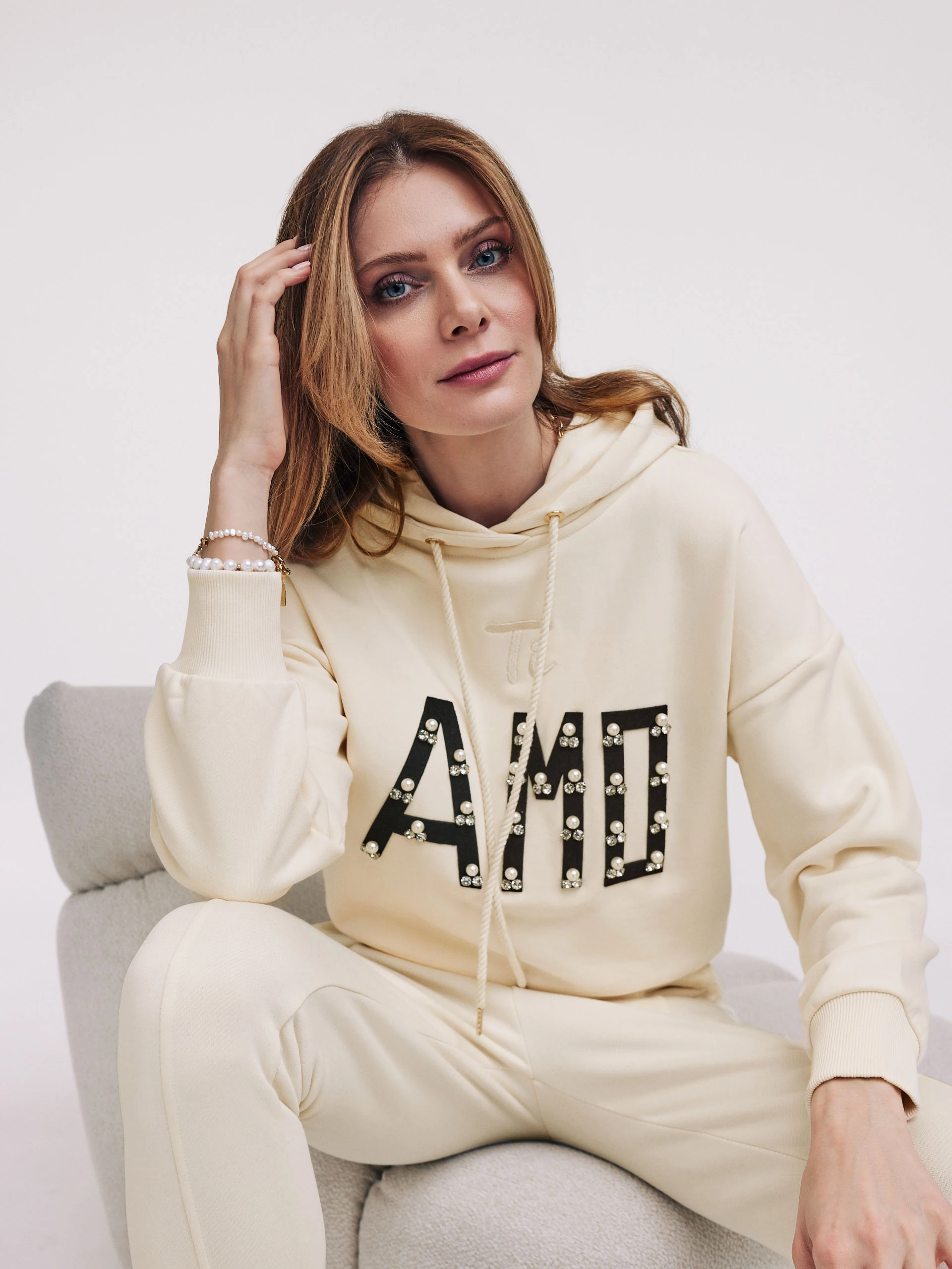 Cream sweatshirt with inscription and hoodie