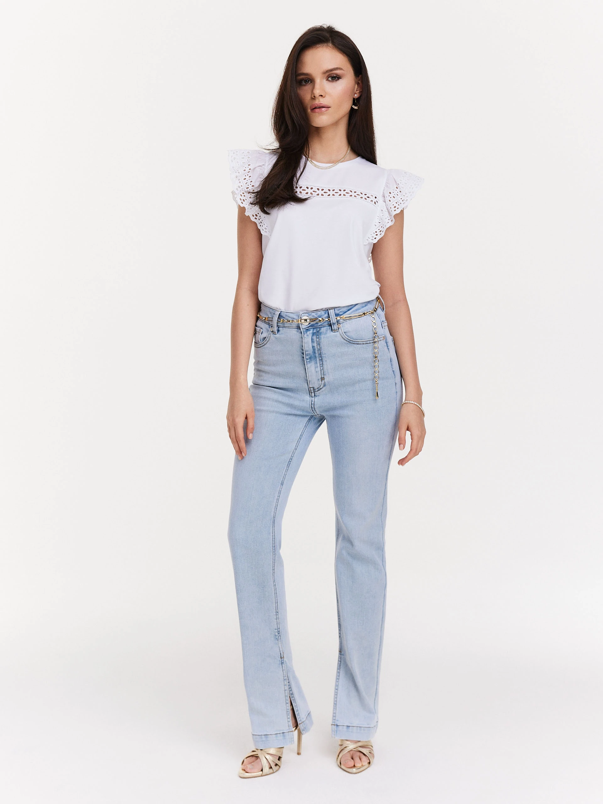 Light denim pants with slits