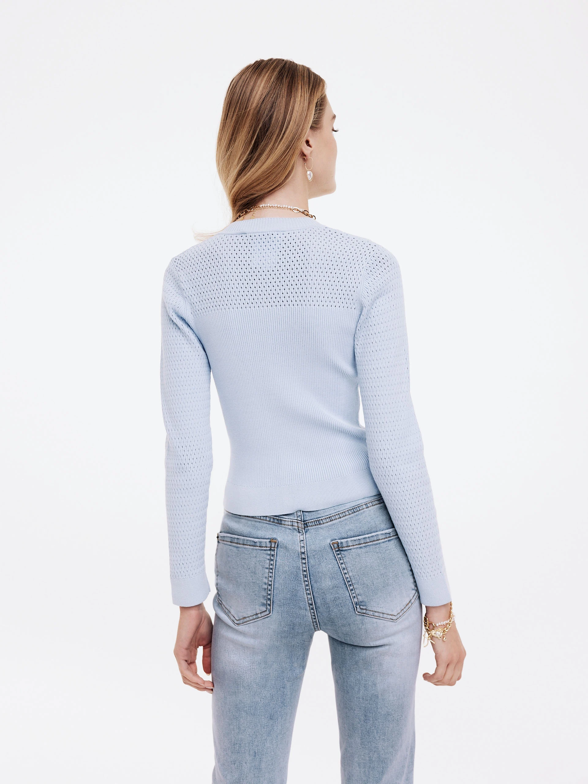 Blue sweater fastened with buttons