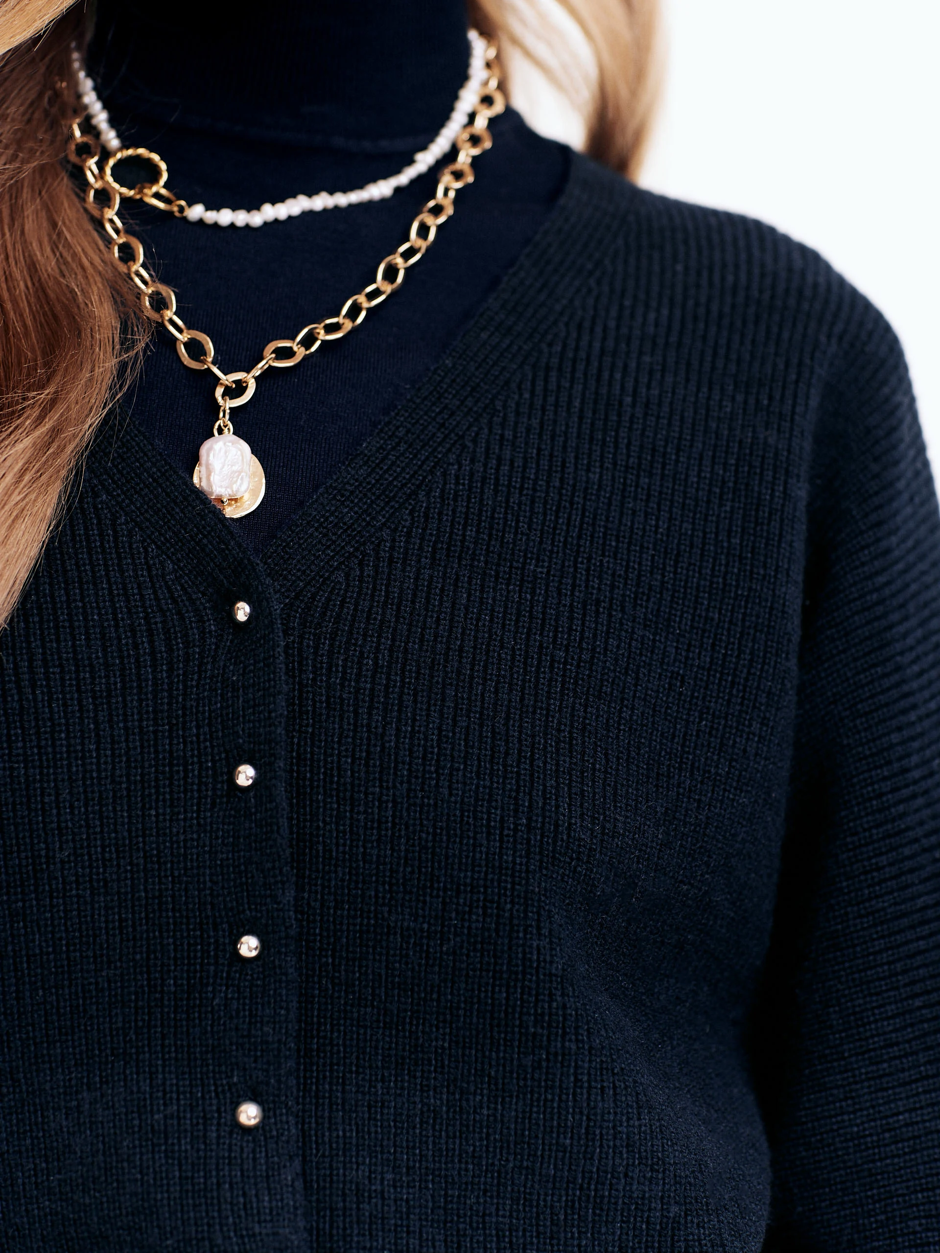 Navy blue cardigan with buff sleeves