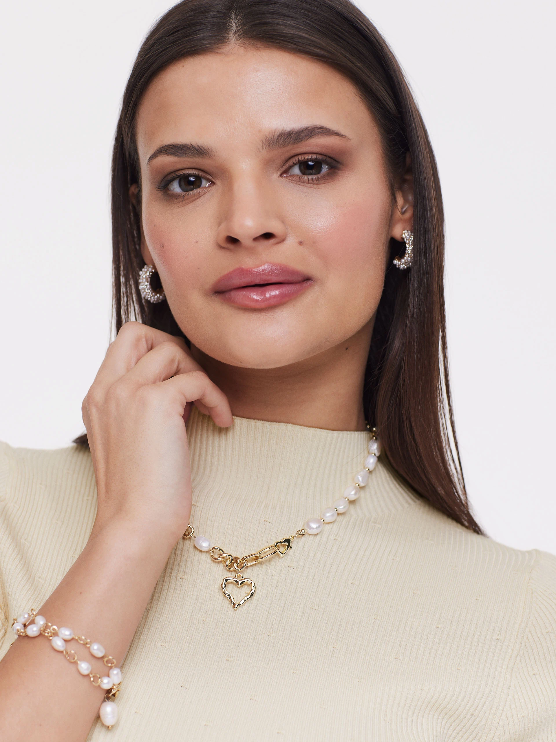 Fitted half turtleneck in ribbed knit fabric