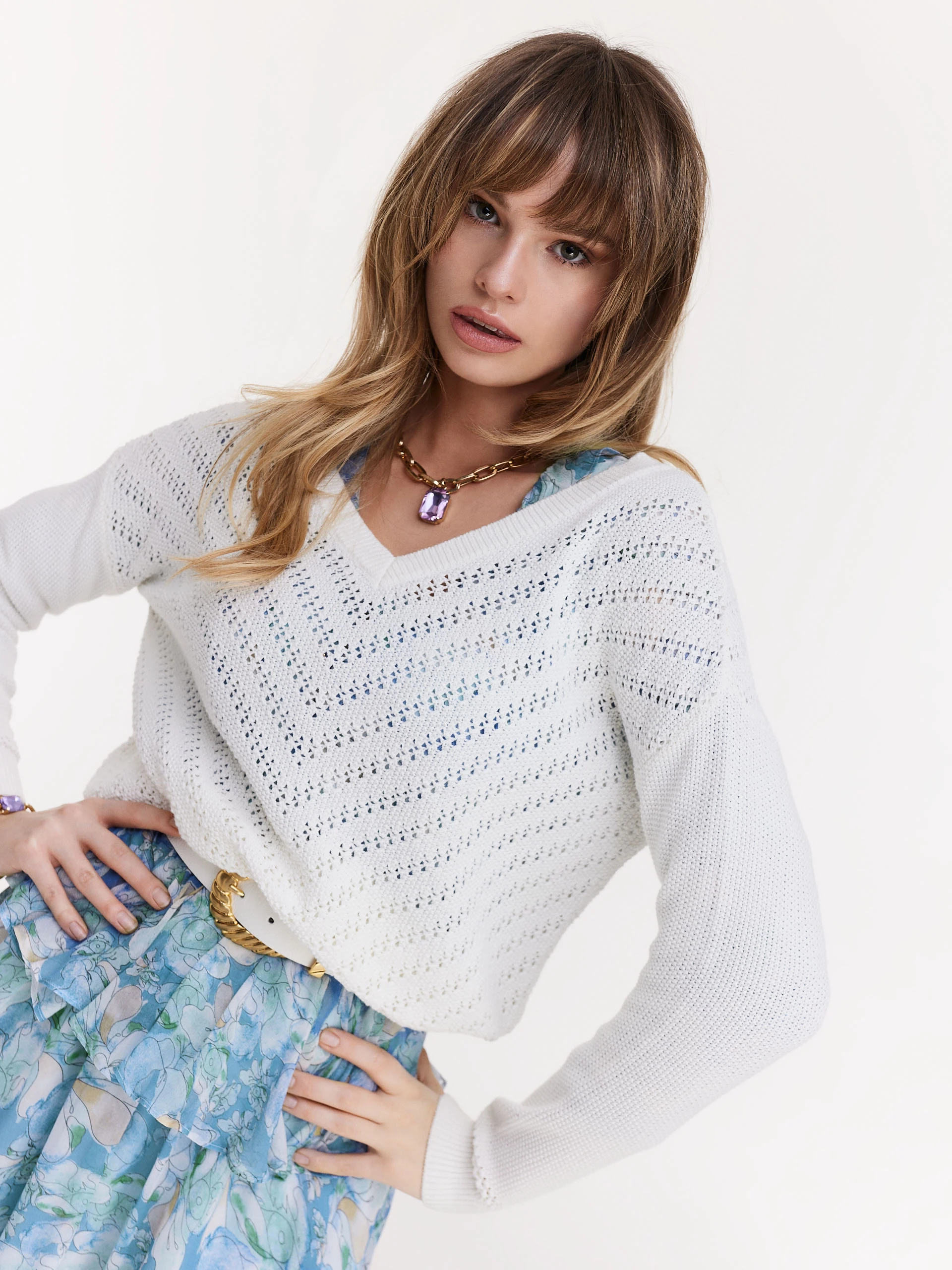 Cream sweater with shiny threads