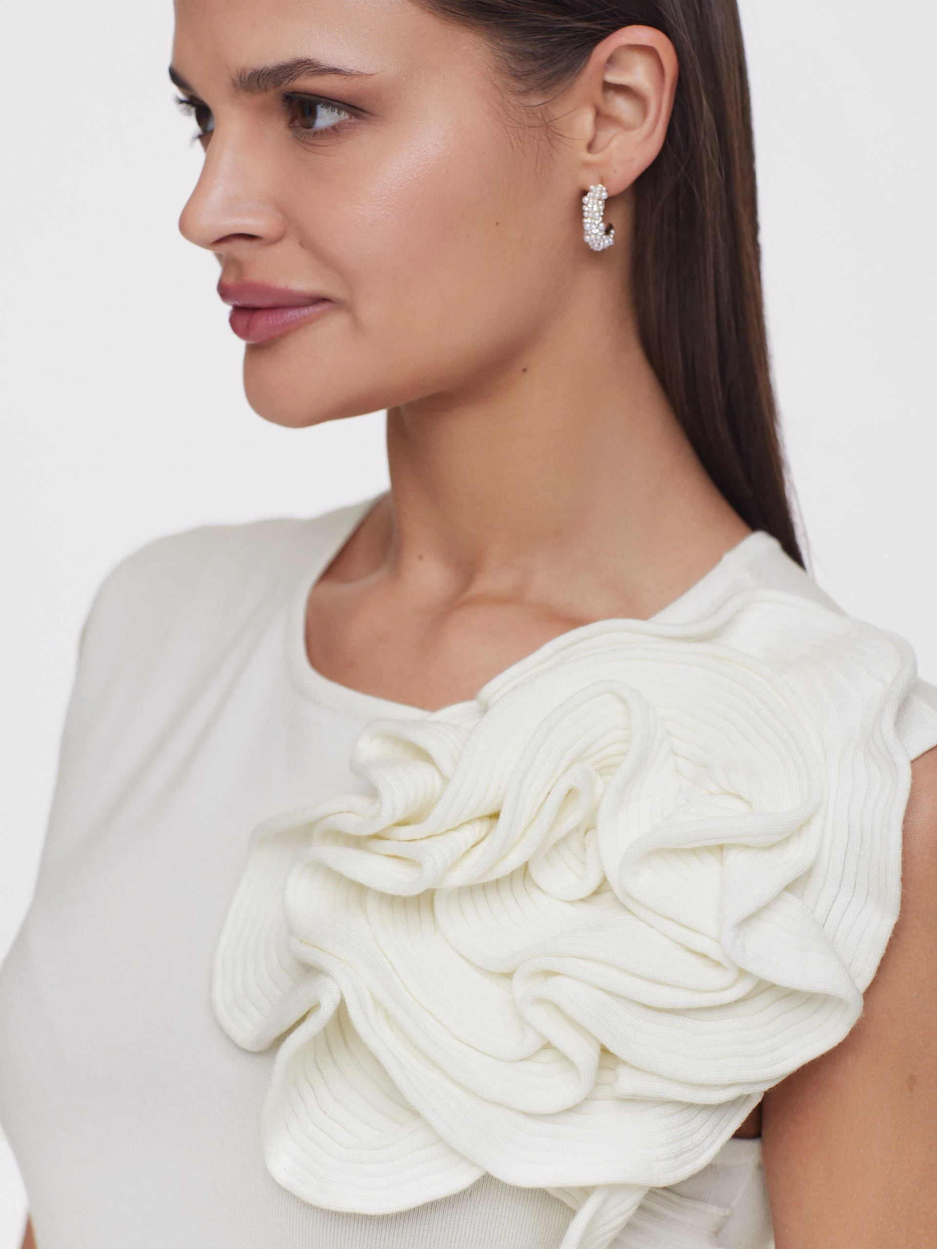 Cream blouse with three-dimensional flower