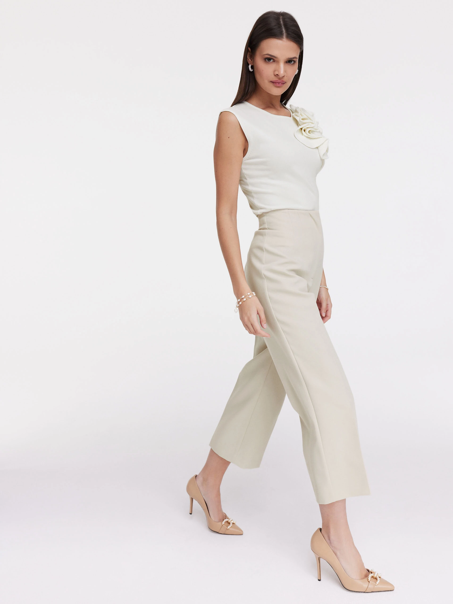 Cream blouse with three-dimensional flower