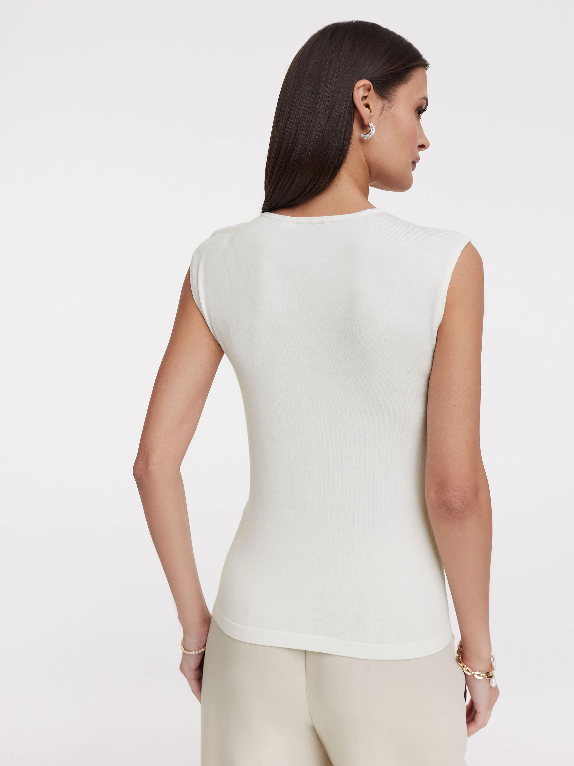 Cream blouse with three-dimensional flower