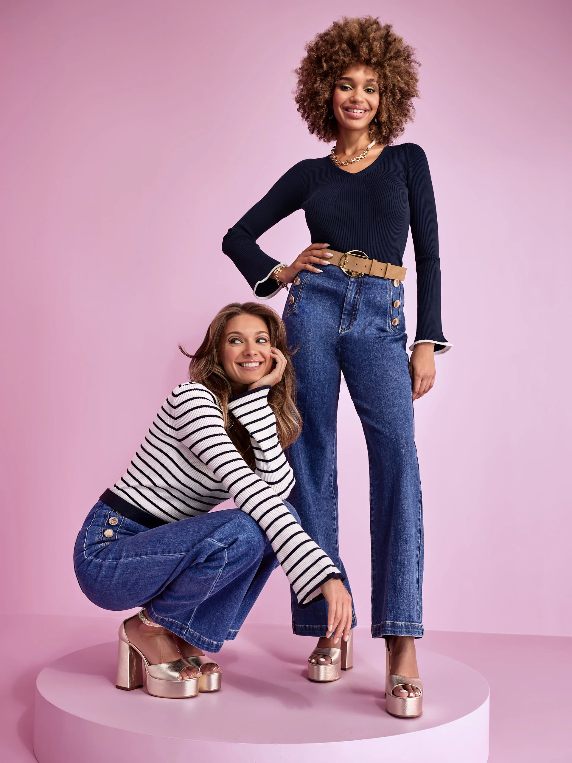 Navy blue sweater with flared sleeves