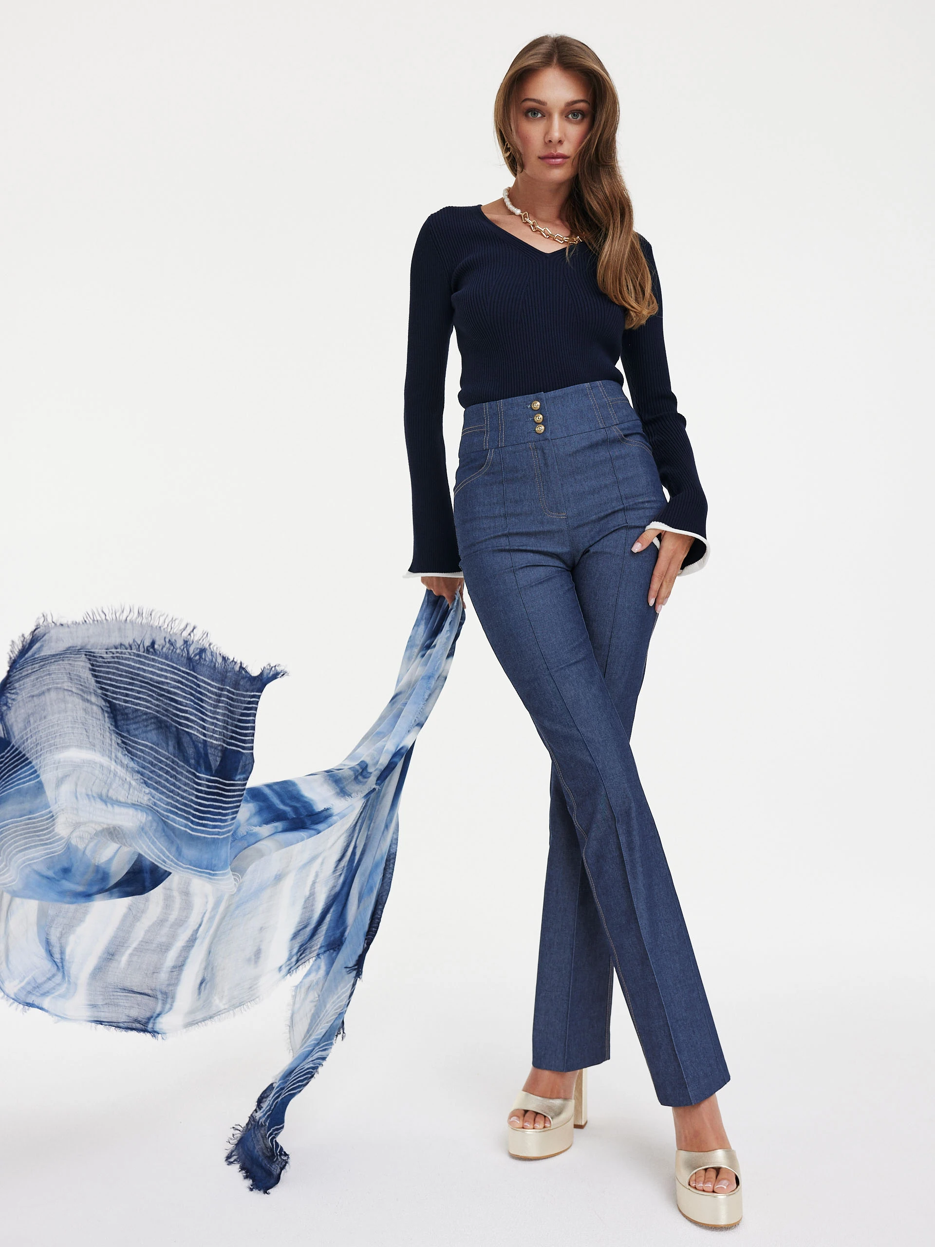Navy blue sweater with flared sleeves