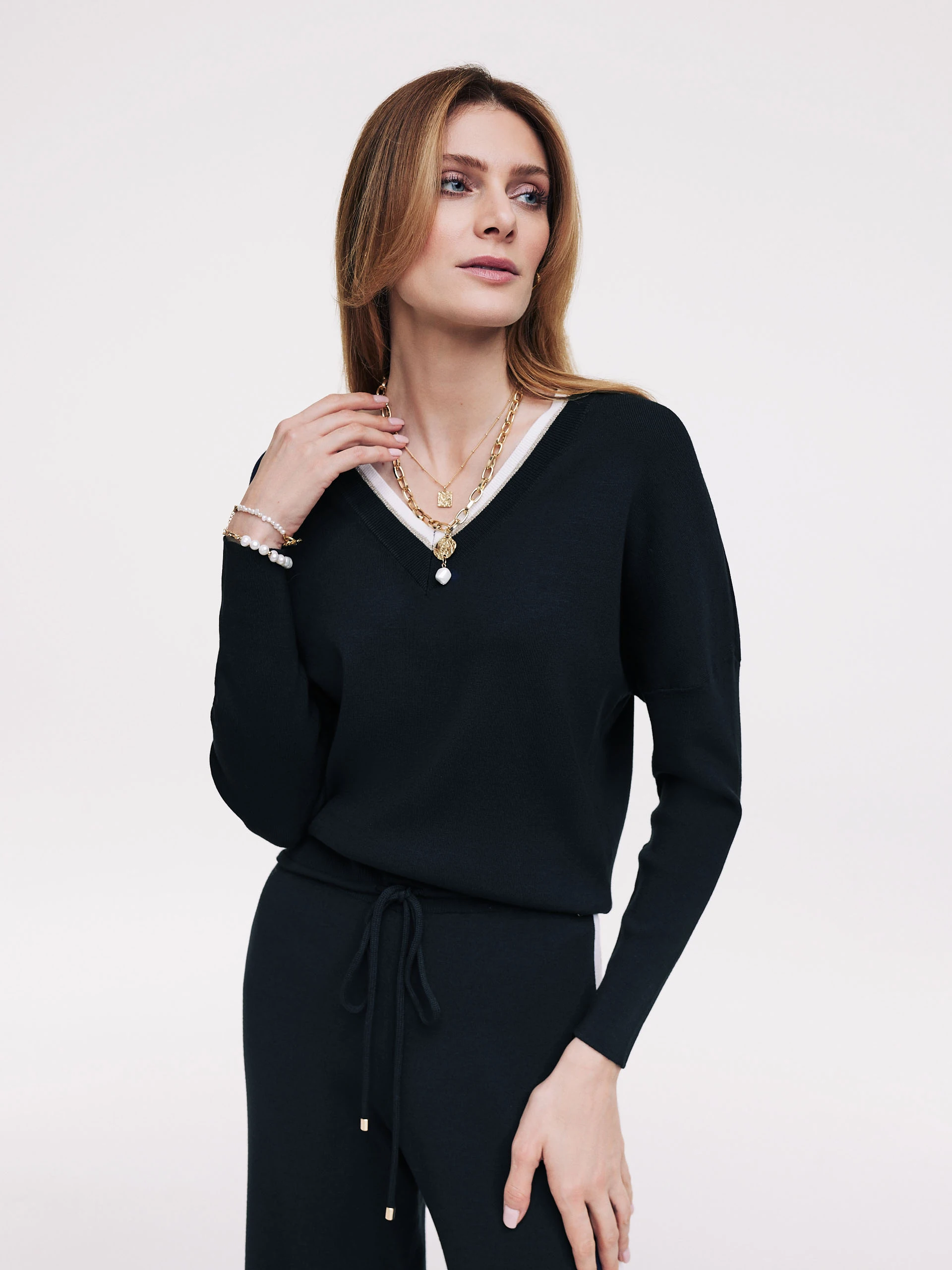 Navy blue sweater with metallic threads